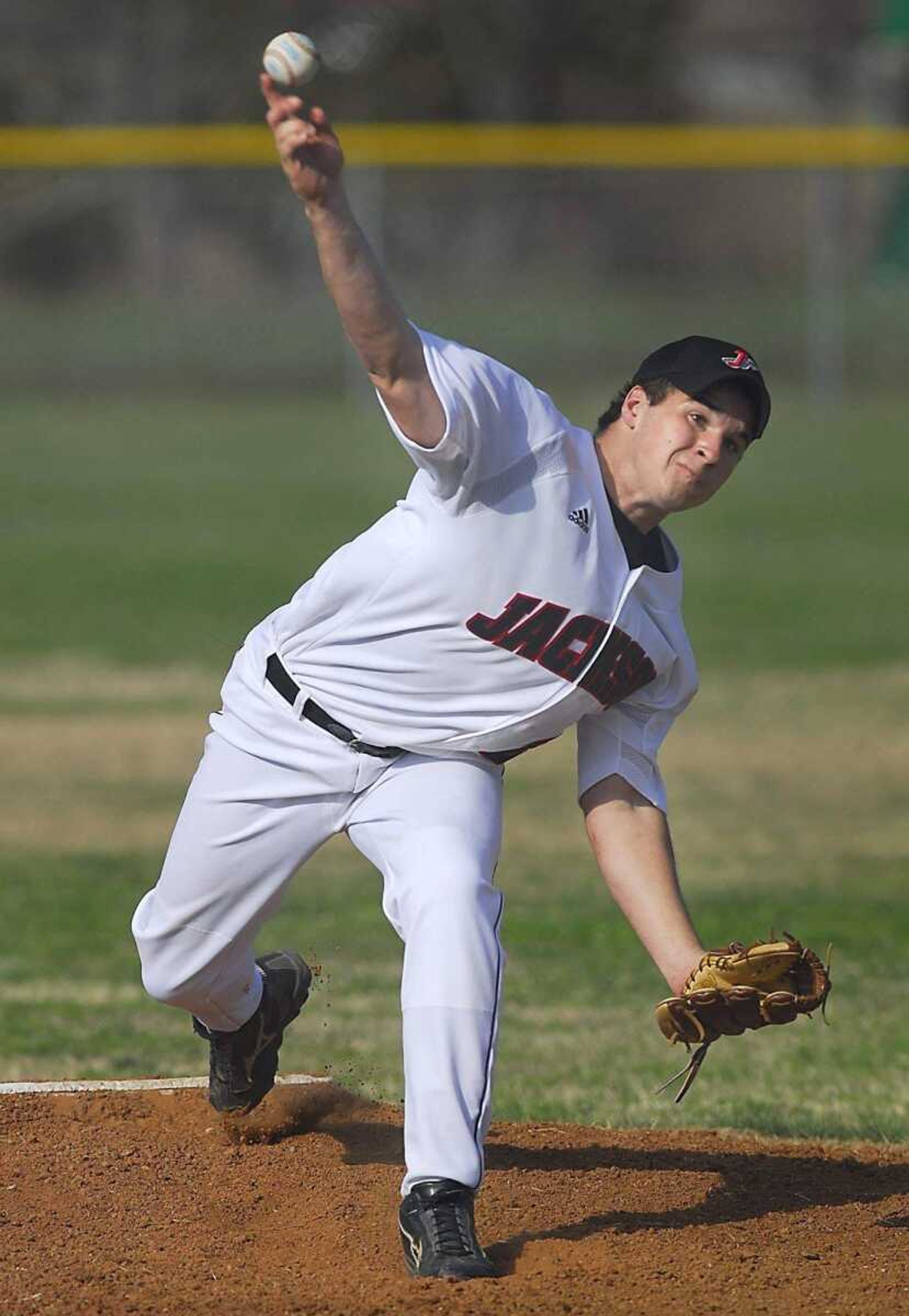 KIT DOYLE ~ kdoyle@semissourian.comJackson's Caleb Hosey delivers against Scott City Monday, March 23, 2009, in Scott City.