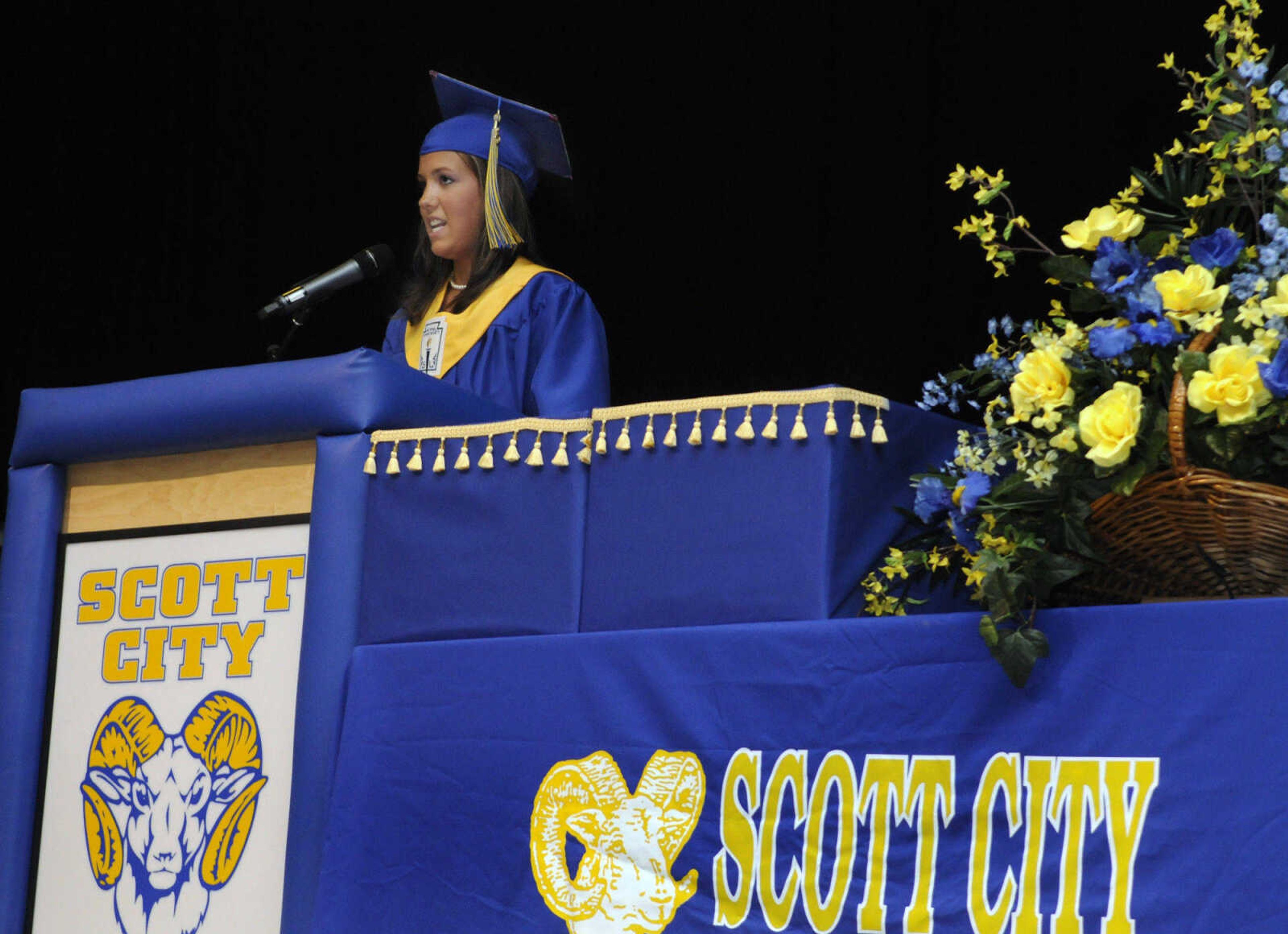 KRISTIN EBERTS ~ keberts@semissourian.com

Class President Rachel Reed gives the introductory remarks during Scott City High School's 2010 Commencement in the school gym on Sunday, May 23.