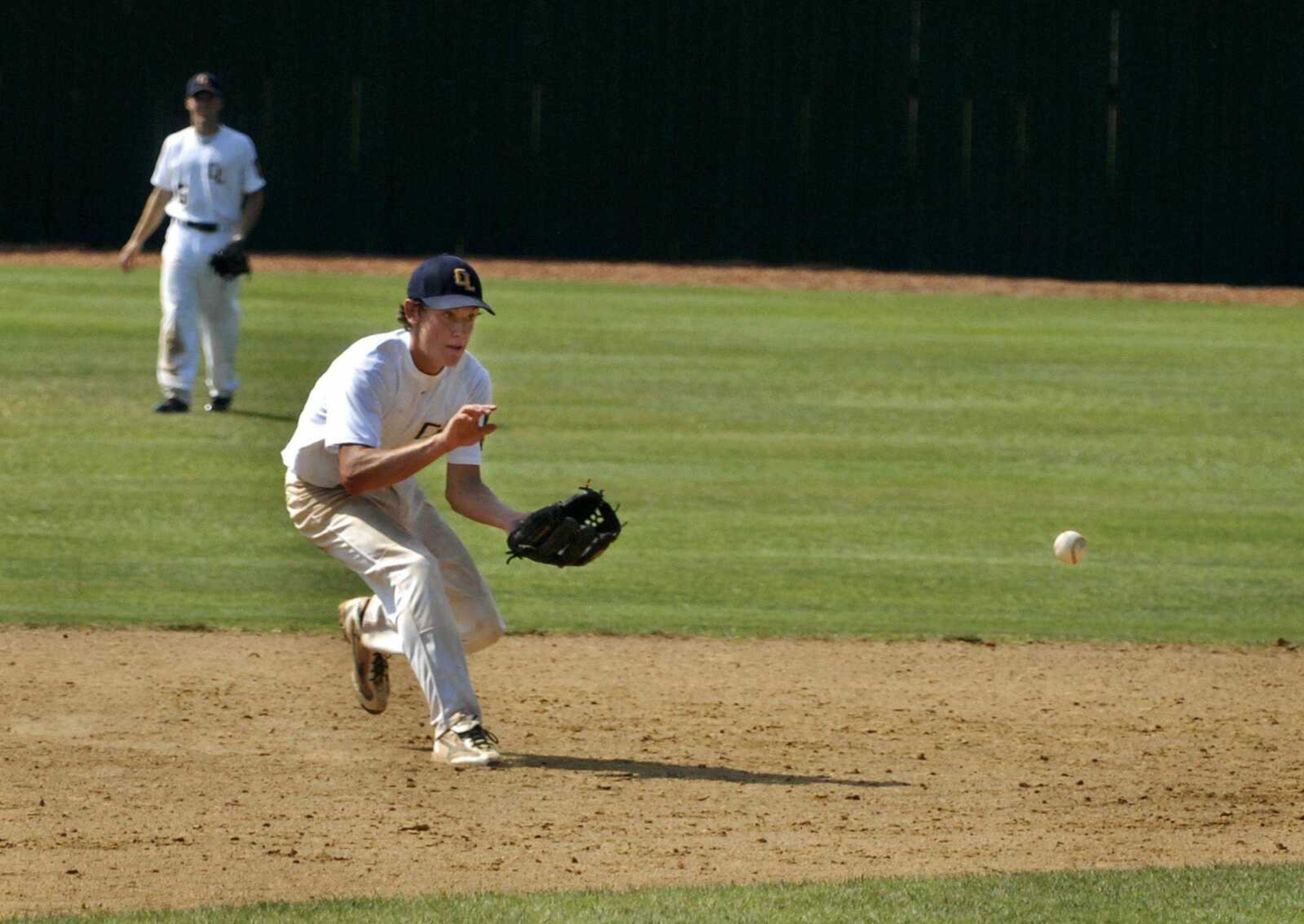 Post 63 shortstop Jimmy Obermark fields a grounder against Tri-County during the third inning Wednesday. (KRISTIN EBERTS ~ kebertssemissourian.com)