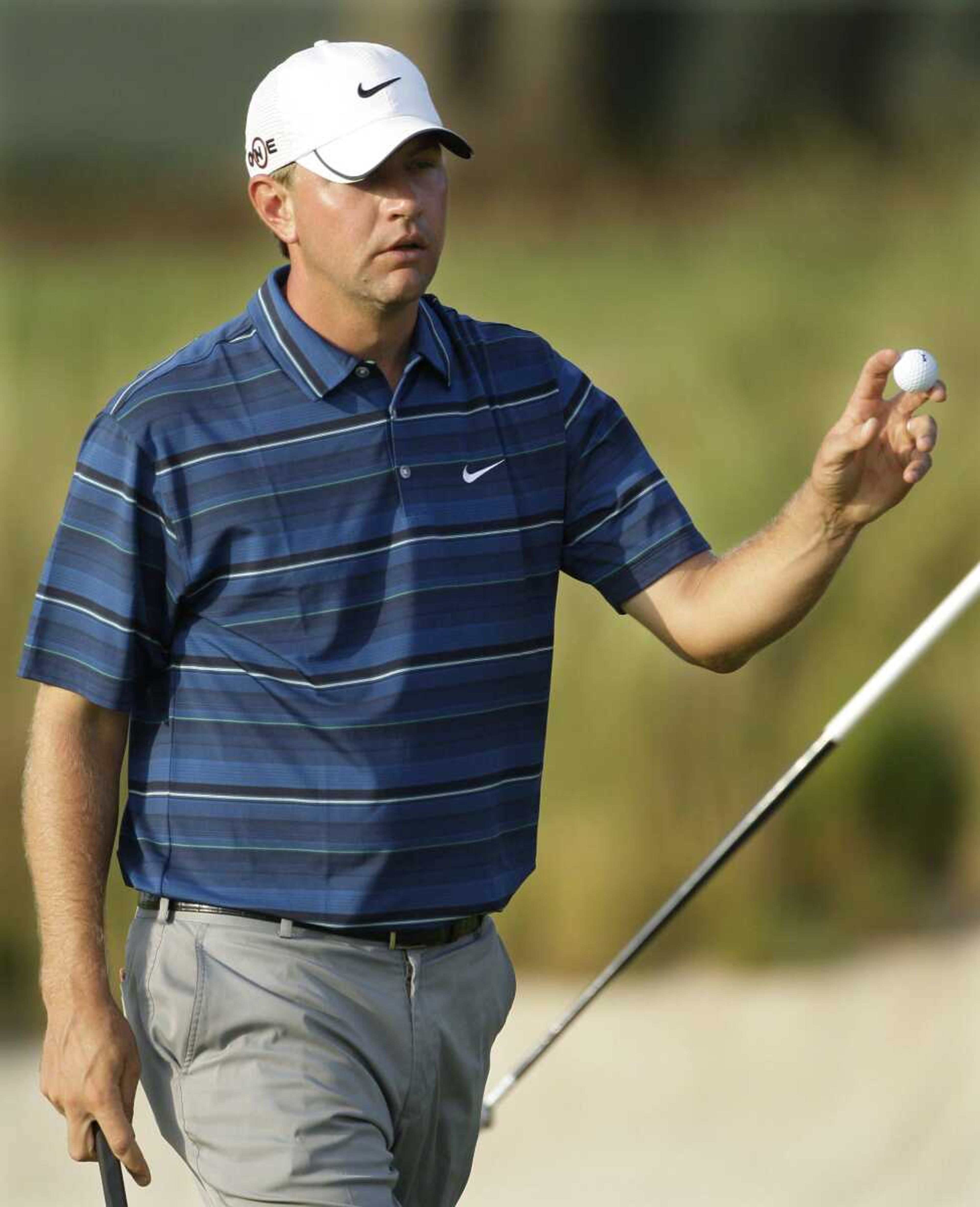 Lucas Glover acknowledges the gallery as he leaves the 16th green during the second round.