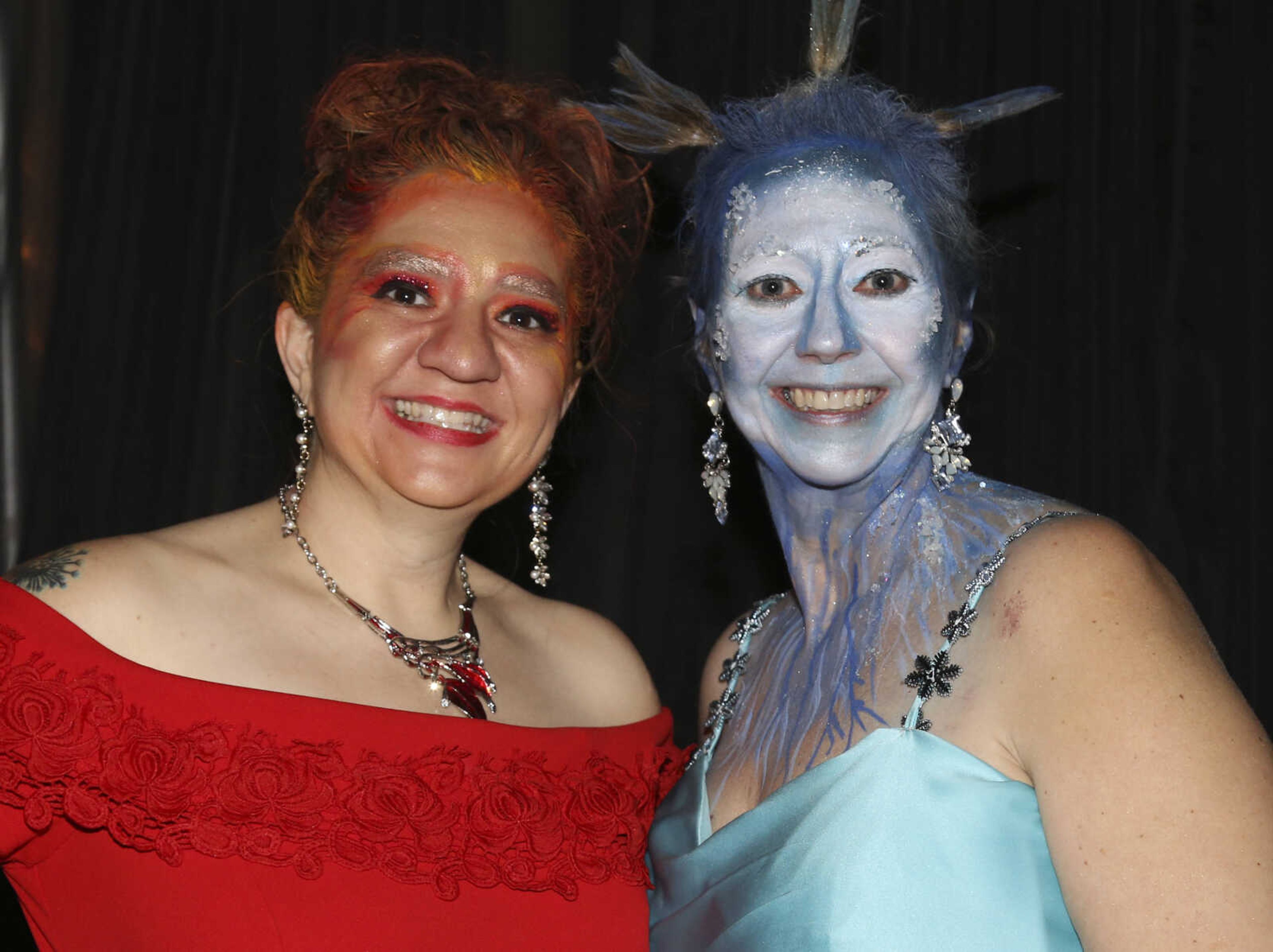 Melissa Stickel, left, and Dwana Leible stop for a photo Saturday, Feb. 3, 2018, during the Fire and Ice Gala at Bavarian Halle in Jackson.