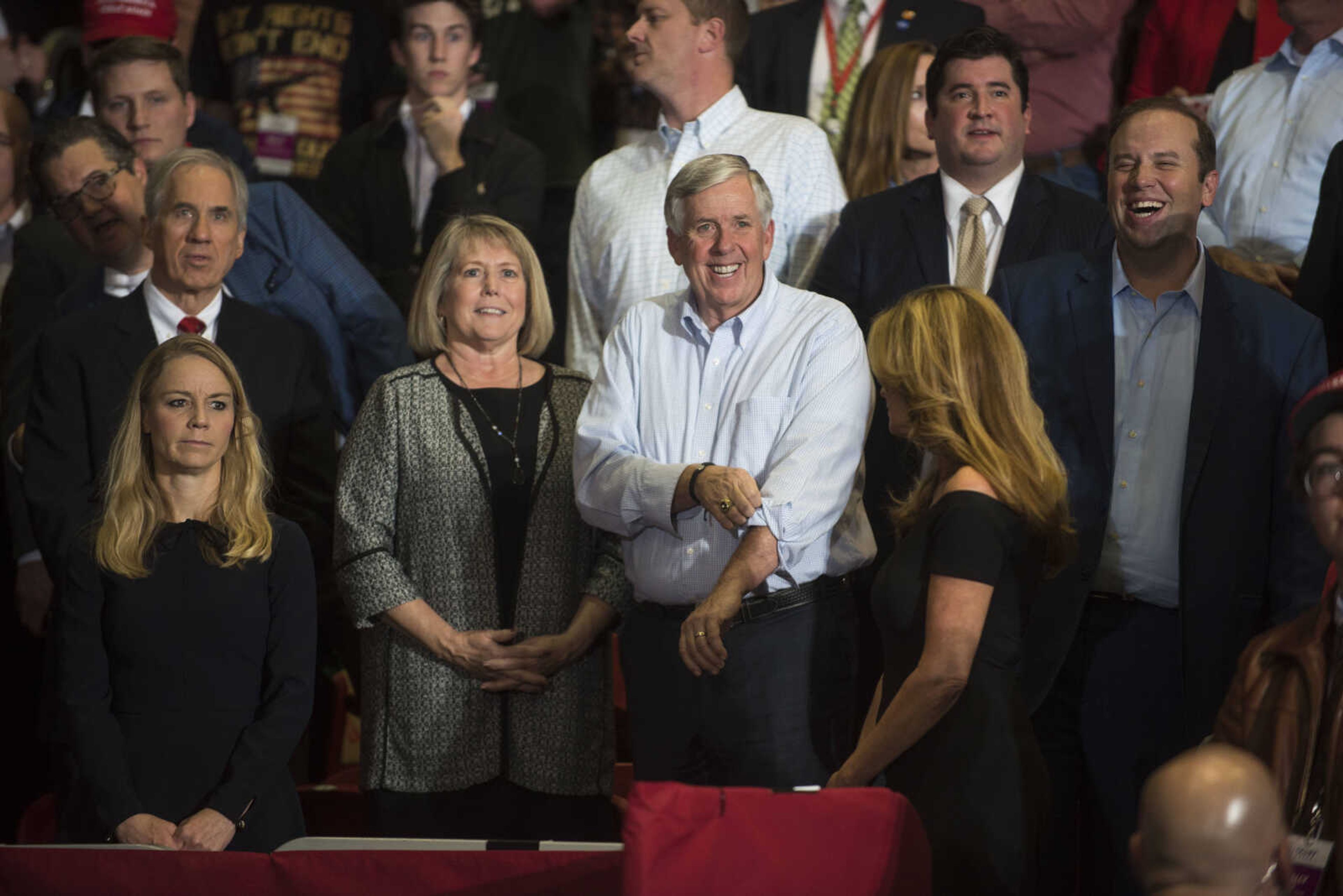 Gov. Mike Parson, center, stands in attendance at a Make America Great Again rally Monday, Nov. 5, 2018, at the Show Me Center in Cape Girardeau.