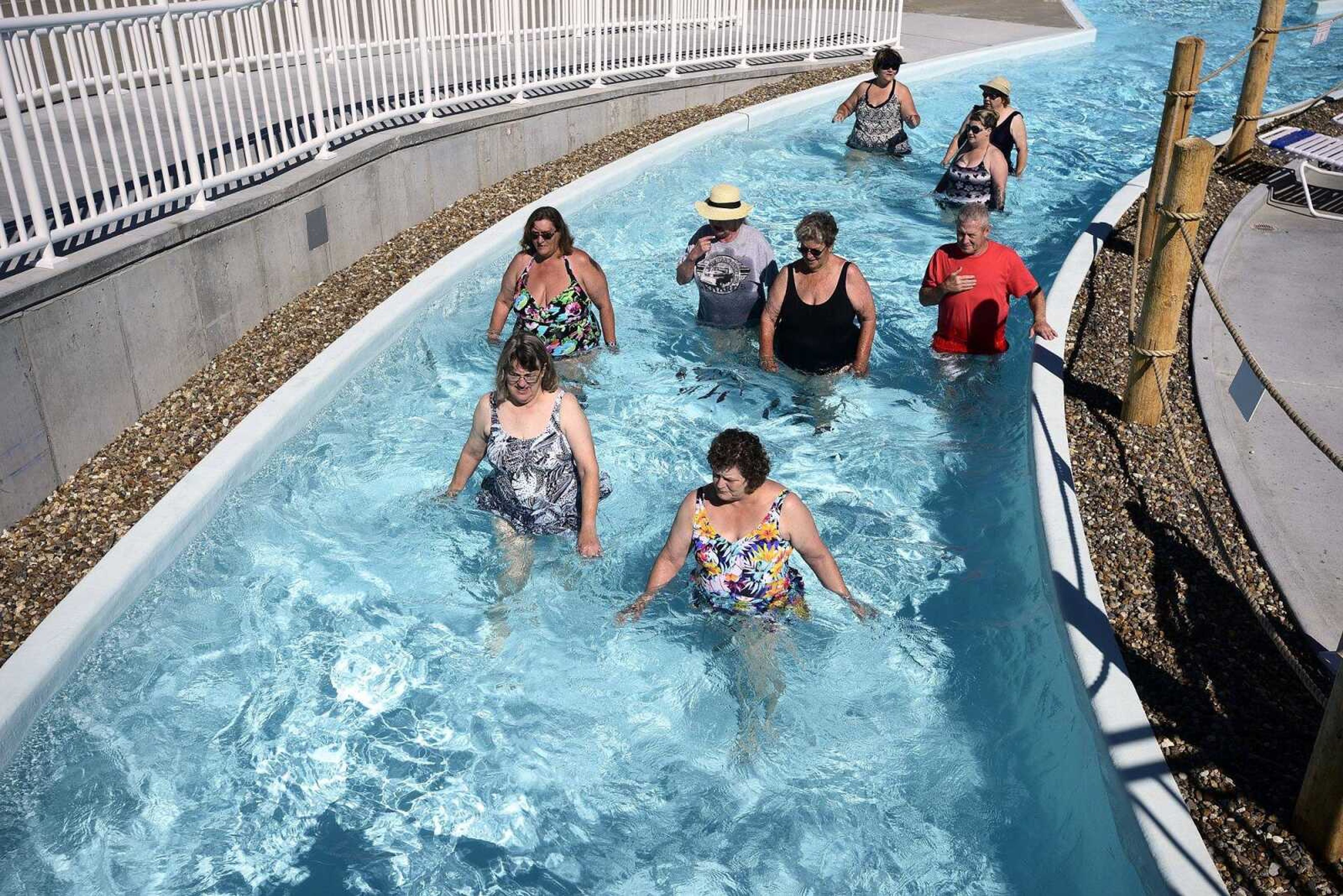 Cutline-Body Copy:People exercise in the lazy river on Monday, June 19, at Cape Splash.