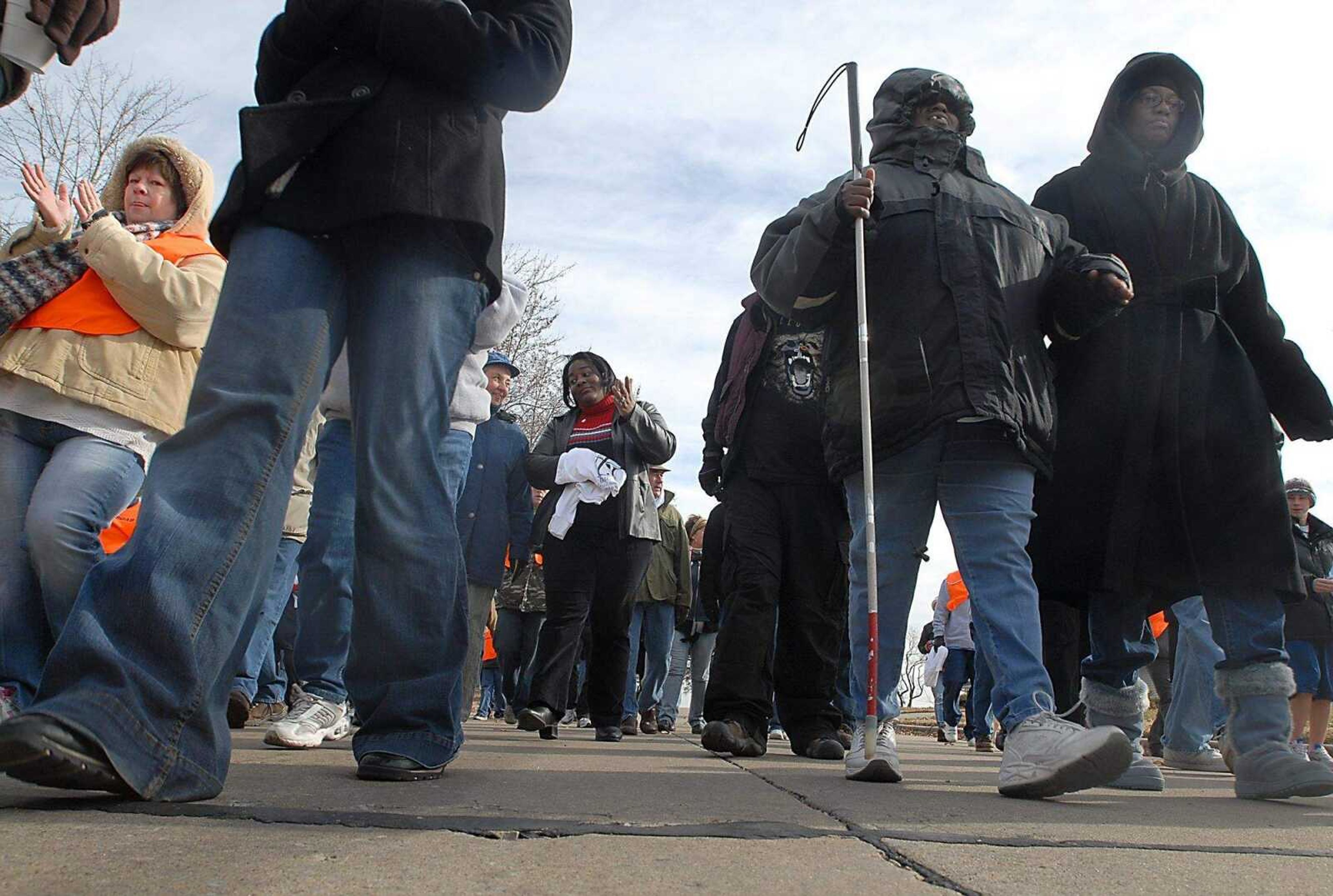 KIT DOYLE ~ kdoyle@semissourian.com
Over 100 people march with Operation Restore Hope Saturday morning, December 6, 2008, along Hackberry St. in south Cape Girardeau. The four mile march started at Ranney Park.