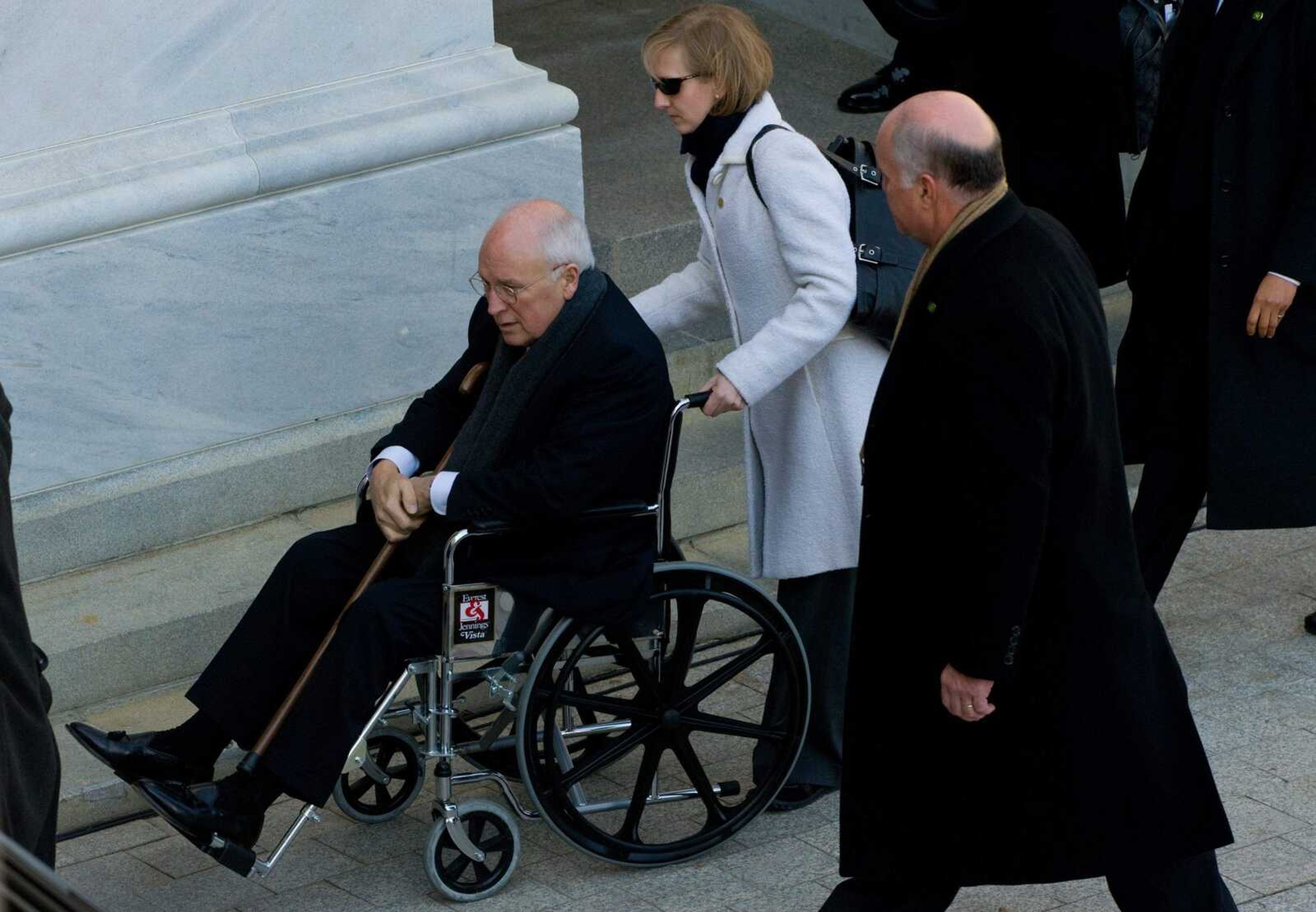 Vice President Dick Cheney arrives in a wheelchair at the U.S. Capitol for the inauguration of Barack Obama as the 44th president in Washington, Tuesday, Jan 20, 2009. (AP Photo/Saul Loeb, Pool)