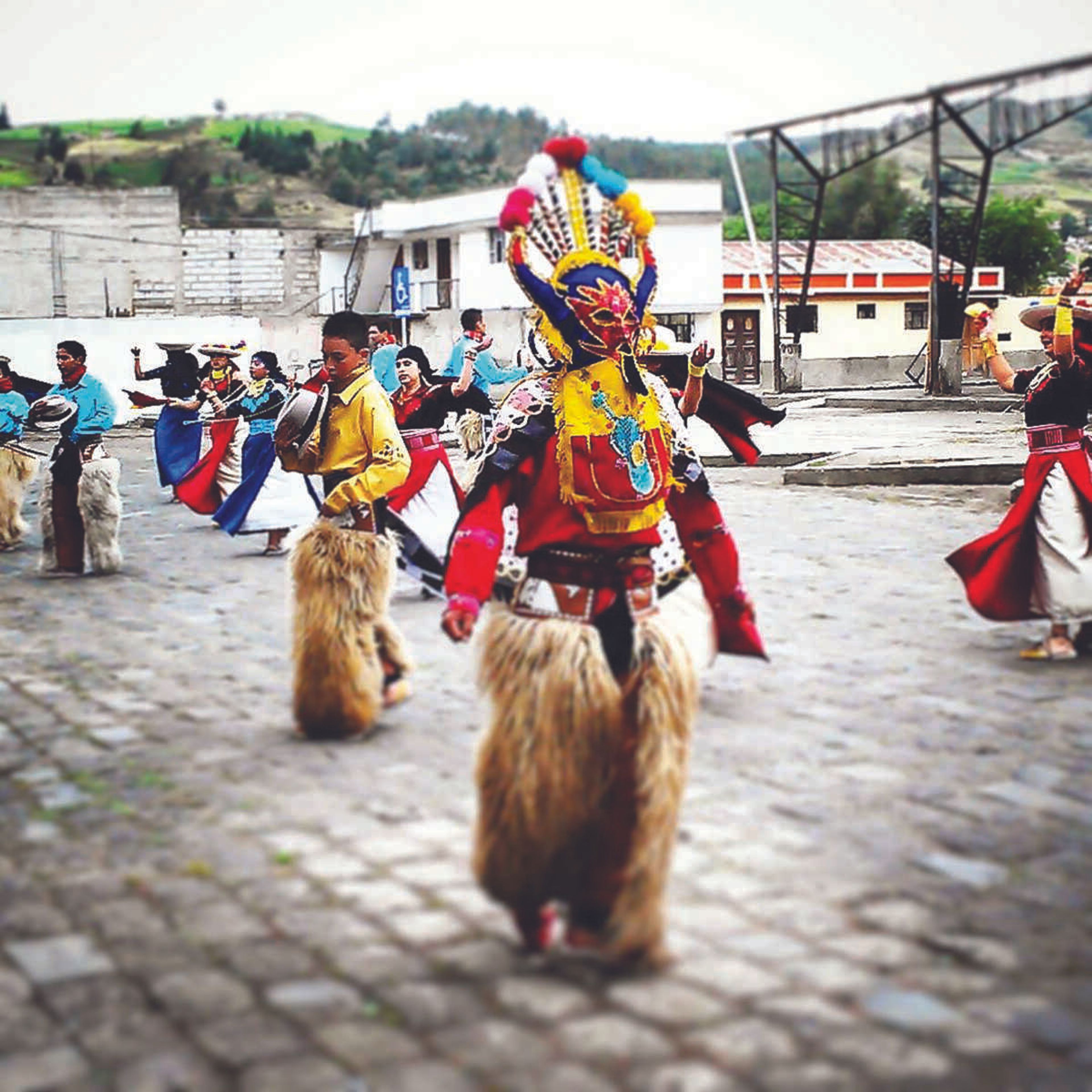 A parade going by Shay's house and featuring the traditional Diablo Humo dance. (submitted photo)