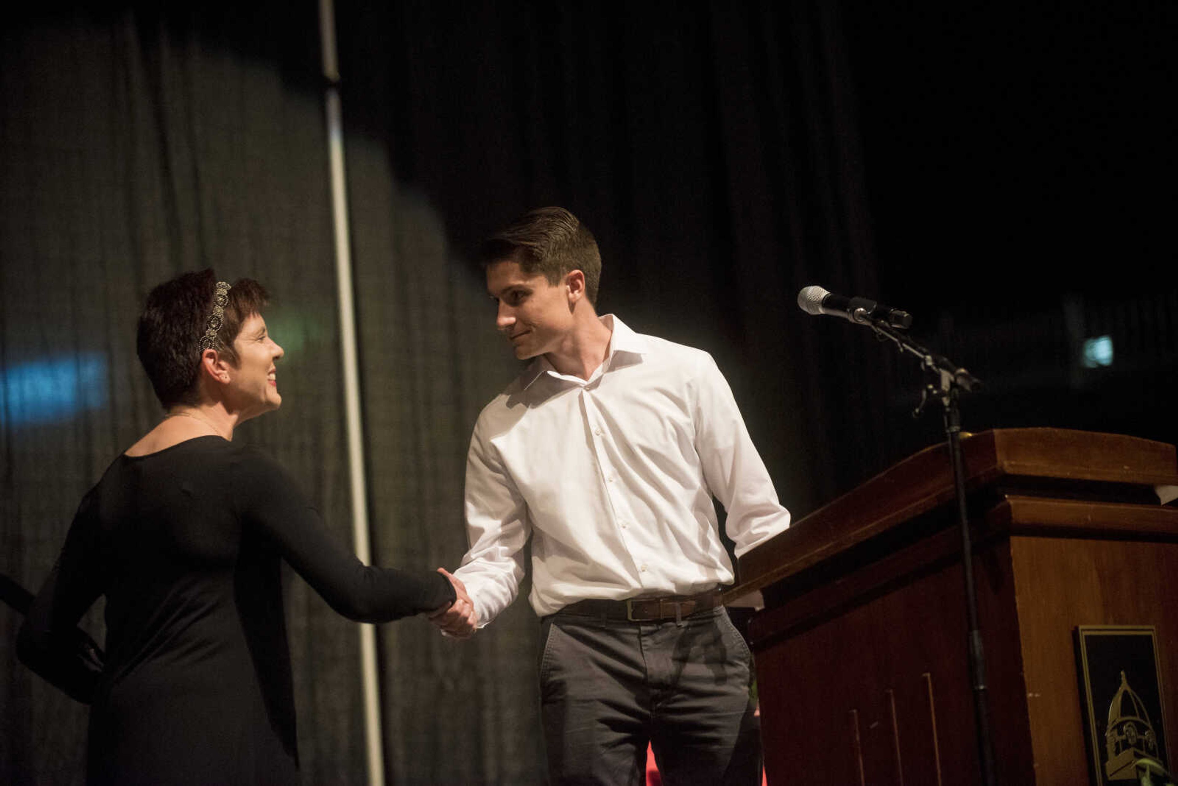 Brooke Clubbs, Instructor and Director of Health Communication is introduced by Evan Schmidt during the Speakers Series at Southeast Missouri State University Thursday, Sept. 14, 2017 at the Show Me Center in Cape Girardeau.