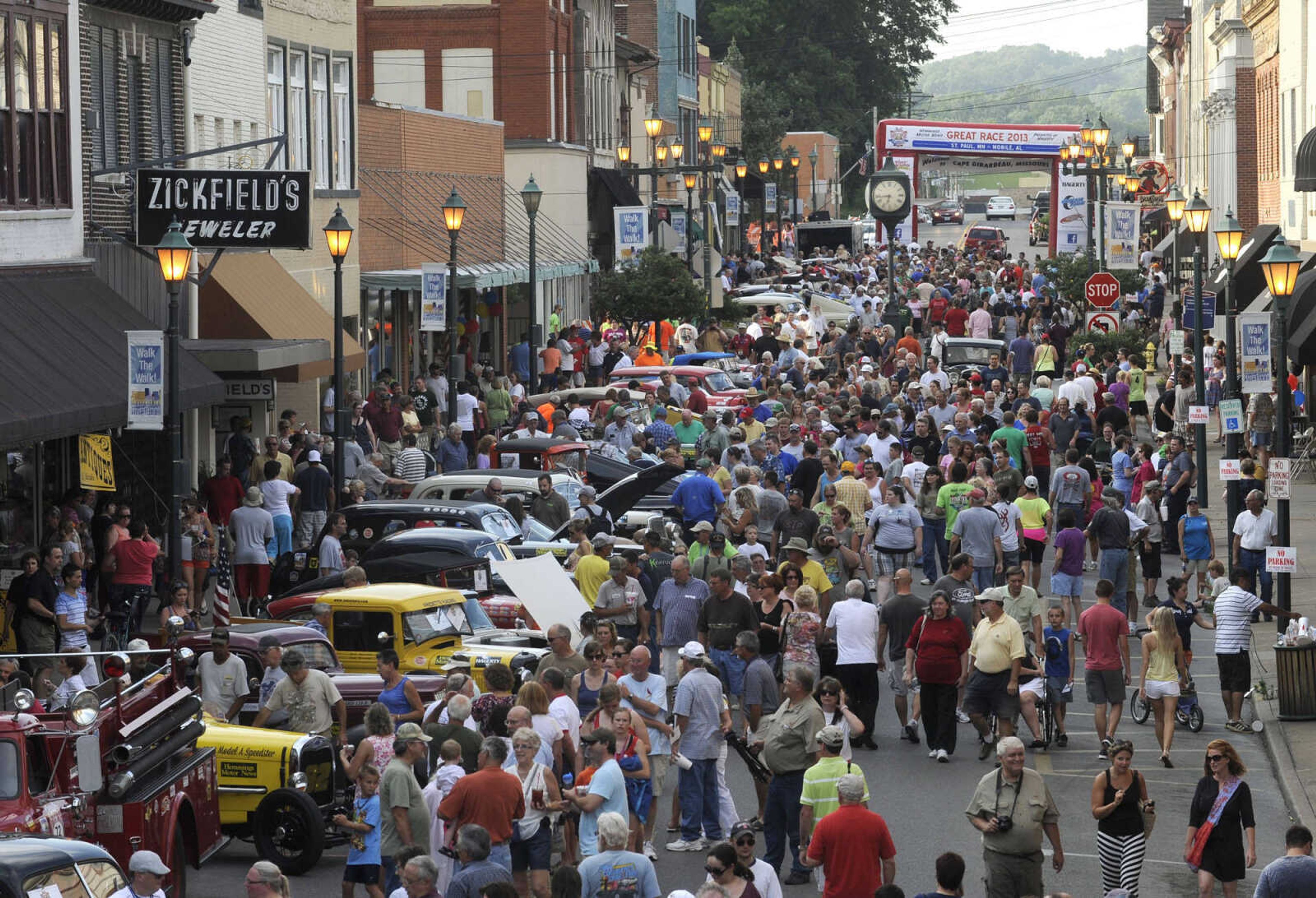 FRED LYNCH ~ flynch@semissourian.com
Main Street is jammed with people and racing cars at the finish line of the Hemming Motor News 2013 Great Race Tuesday, June 25, 2013 in Cape Girardeau.