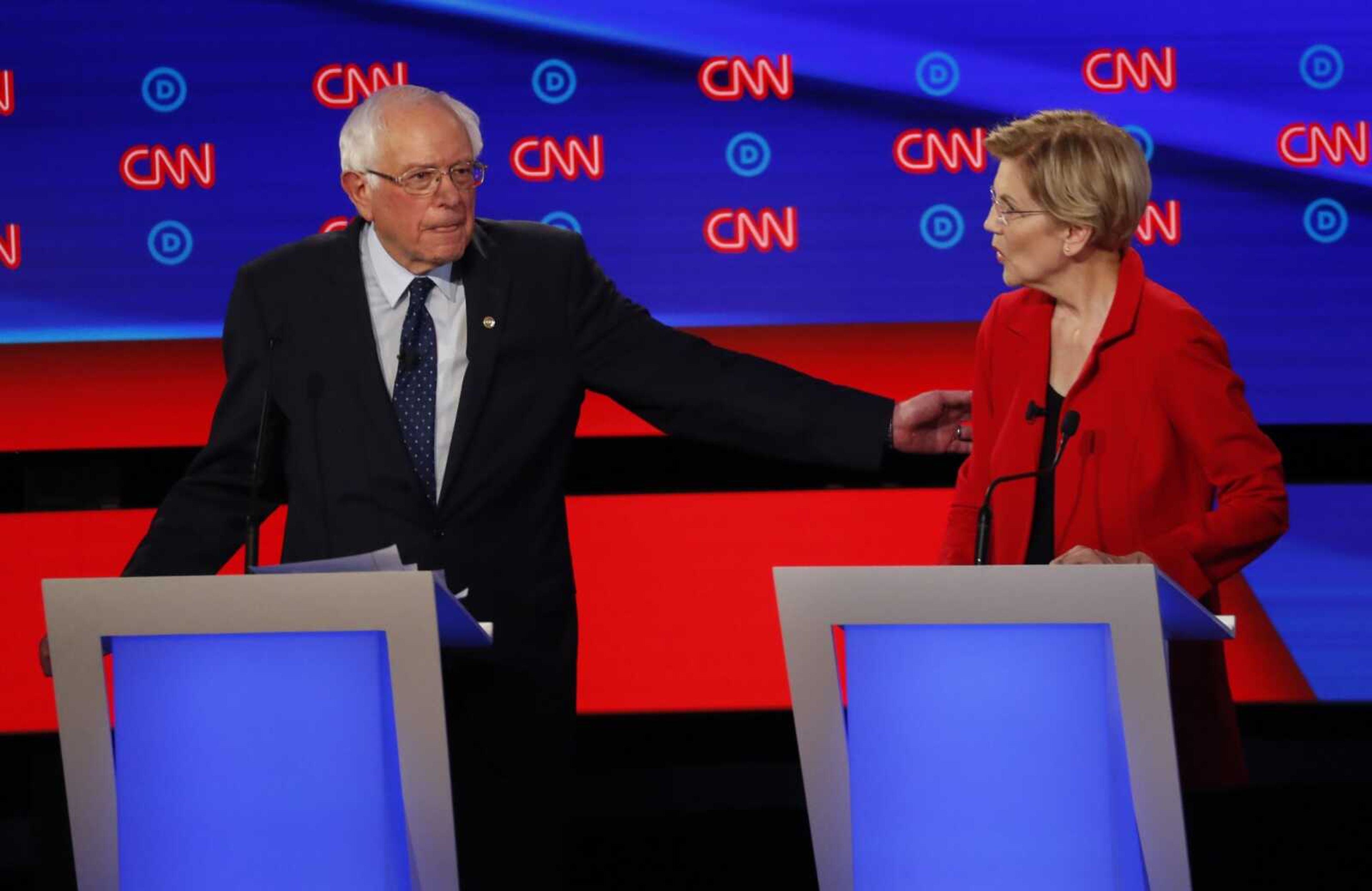 Sen. Bernie Sanders, I-Vt., gestures toward Sen. Elizabeth Warren, D-Mass., during the first of two Democratic presidential primary debates hosted by CNN this week in the Fox Theatre in Detroit.