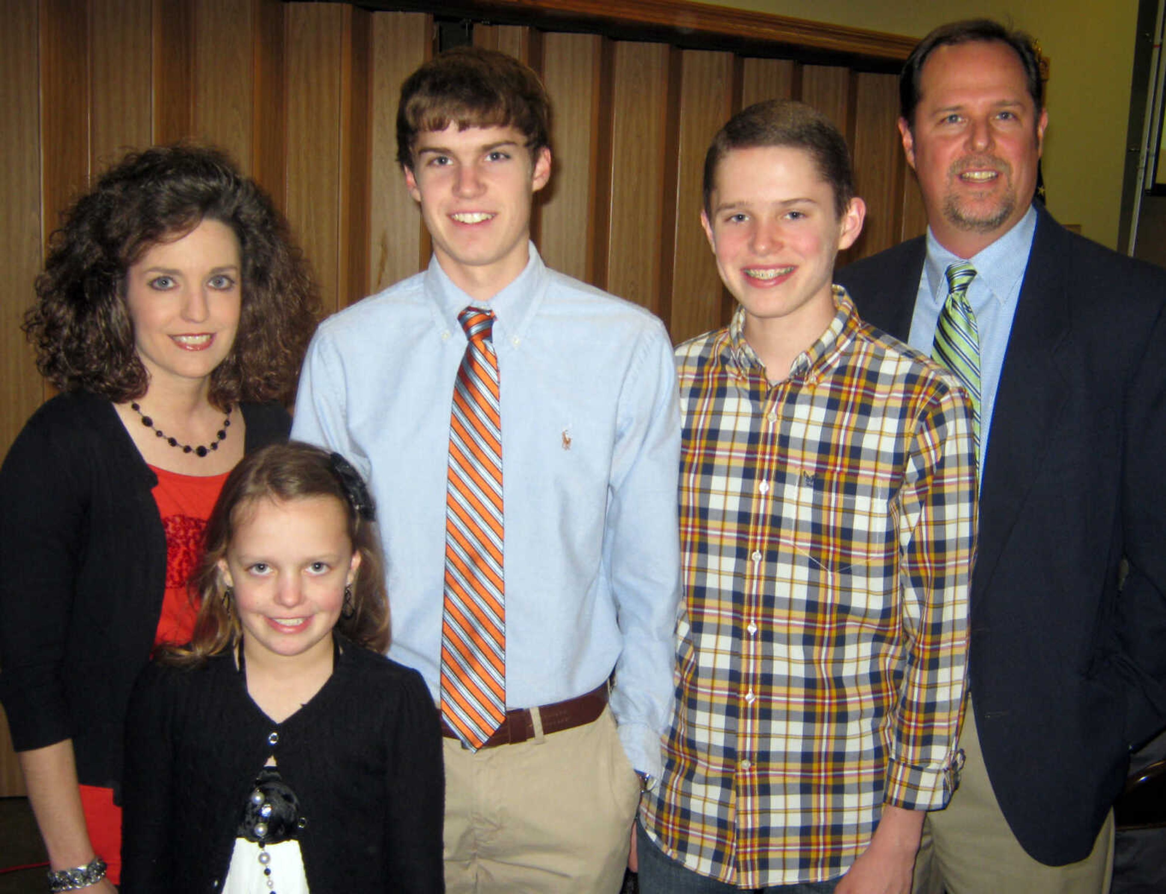 Lori Strickland, left, Lydia Strickland, Caleb Strickland, Levi Strickland, and Mark Strickland of Strickland Engineering pose at the Jackson Area Chamber of Commerce annual awards banquet, Jan. 11, at the the Knights of Columbus Hall in Jackson, Mo.