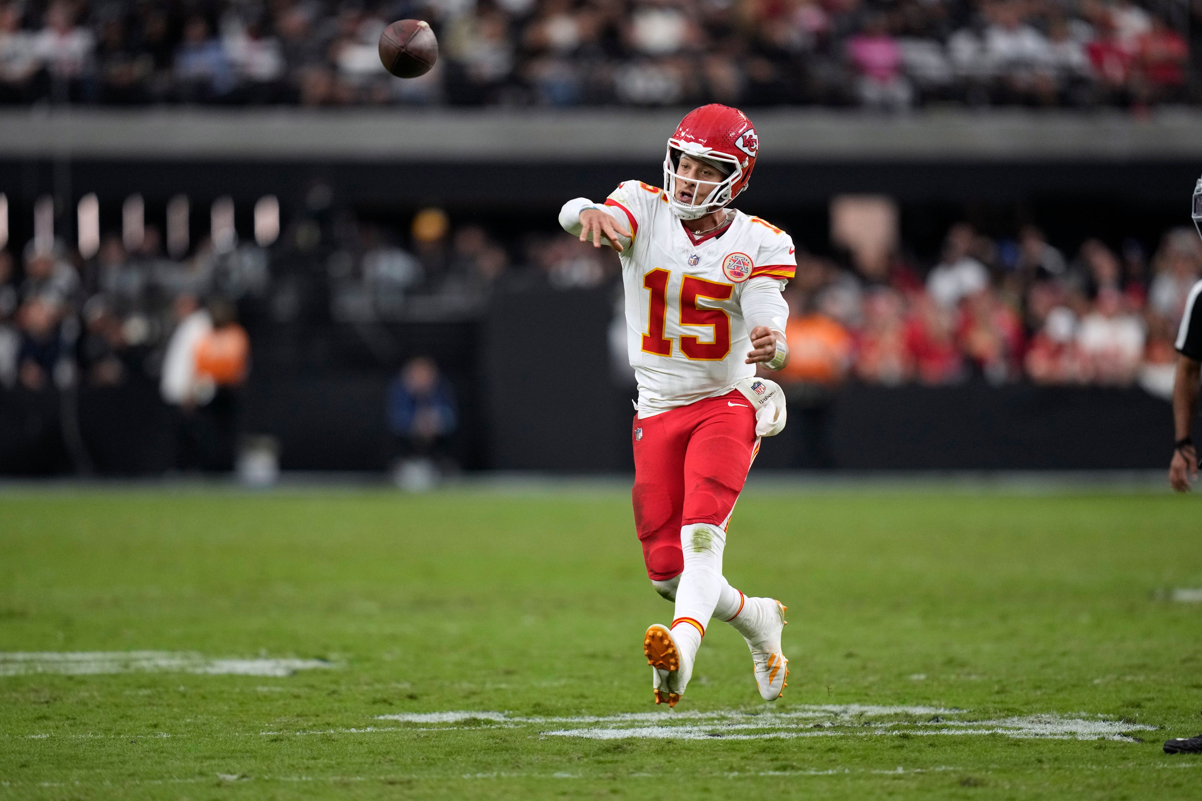 Kansas City Chiefs quarterback Patrick Mahomes (15) throws during the second half of an NFL football game against the Las Vegas Raiders Sunday, Oct. 27, 2024, in Las Vegas. (AP Photo/John Locher)