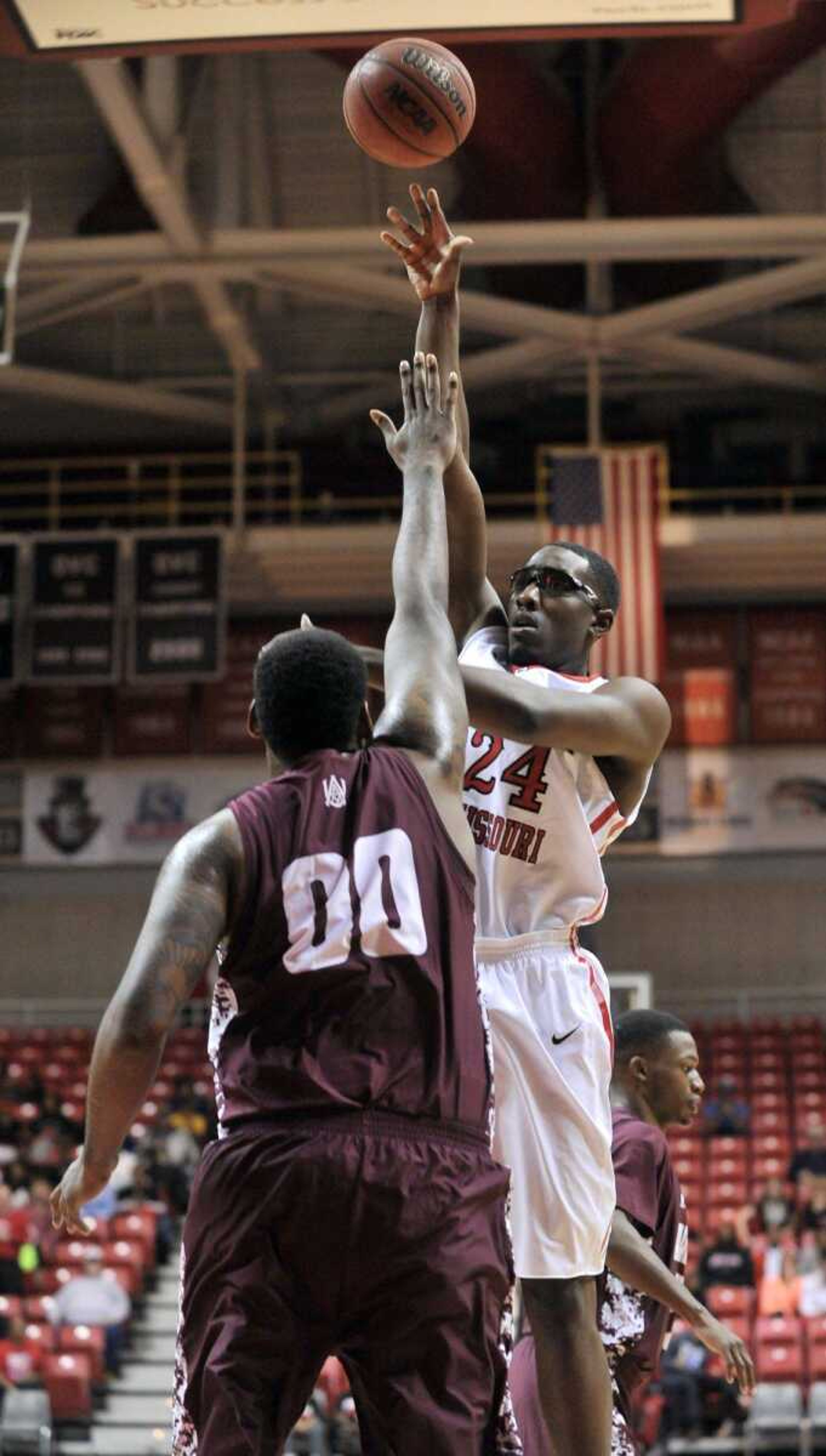 Southeast Missouri State's Aaron Adeoye shoots over Alabama A&M's Isaiah Colton during the first half Saturday, Nov. 29, 2014 at the Show Me Center. (Fred Lynch)