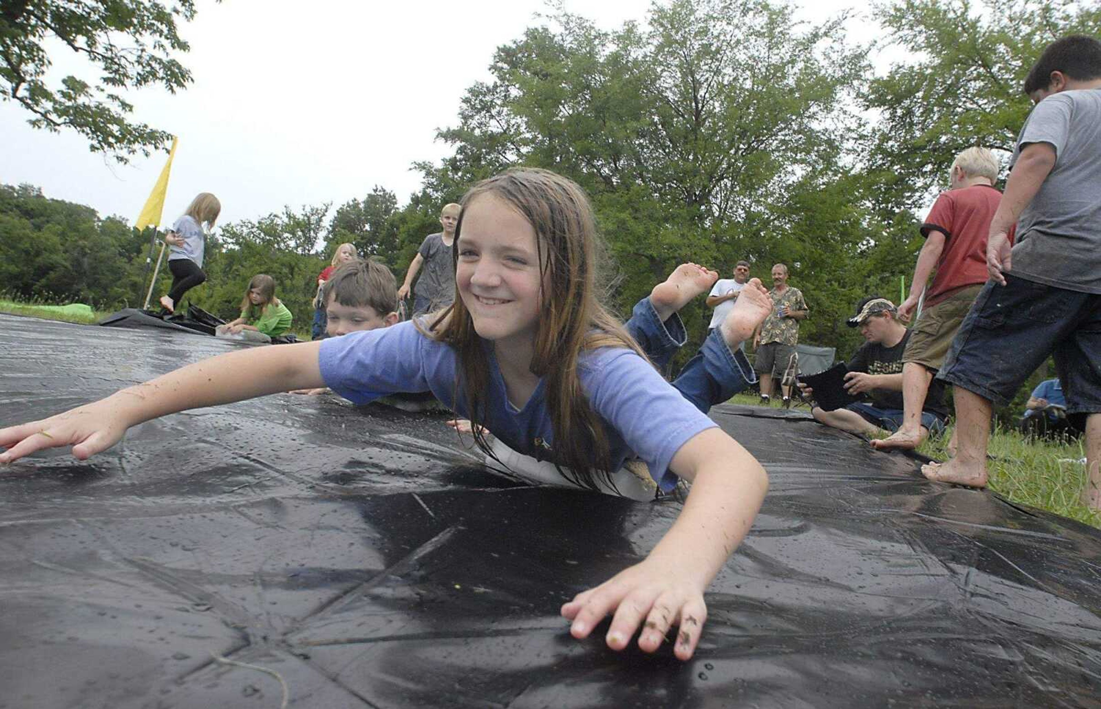 KIT DOYLE ~ kdoyle@semissourian.com
Anna Thomsen, 11, ice blocking at Pellegrino Park in Marble HIll.