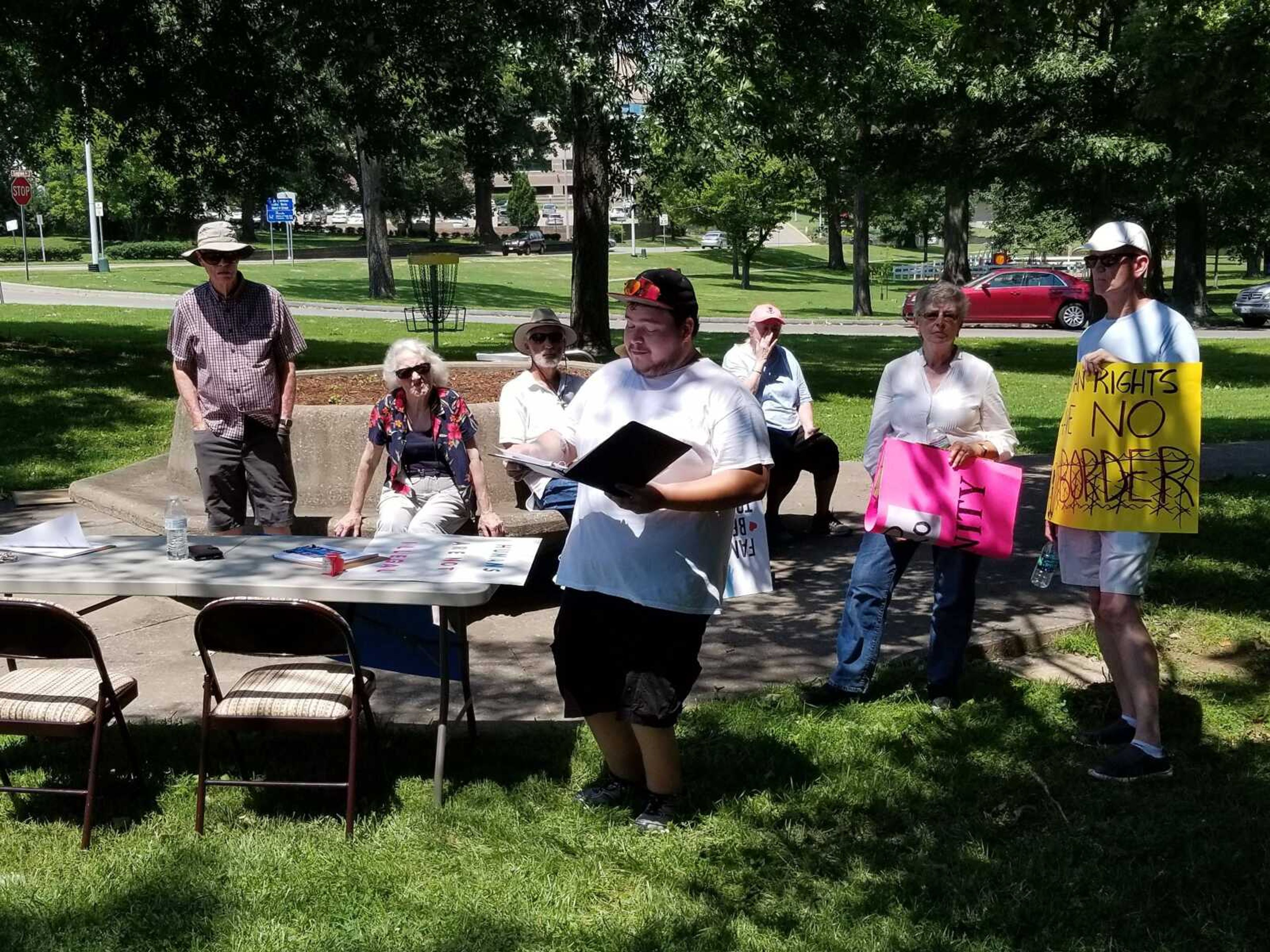 Aaron Lerma, organizer, read clips from immigrant stories. 