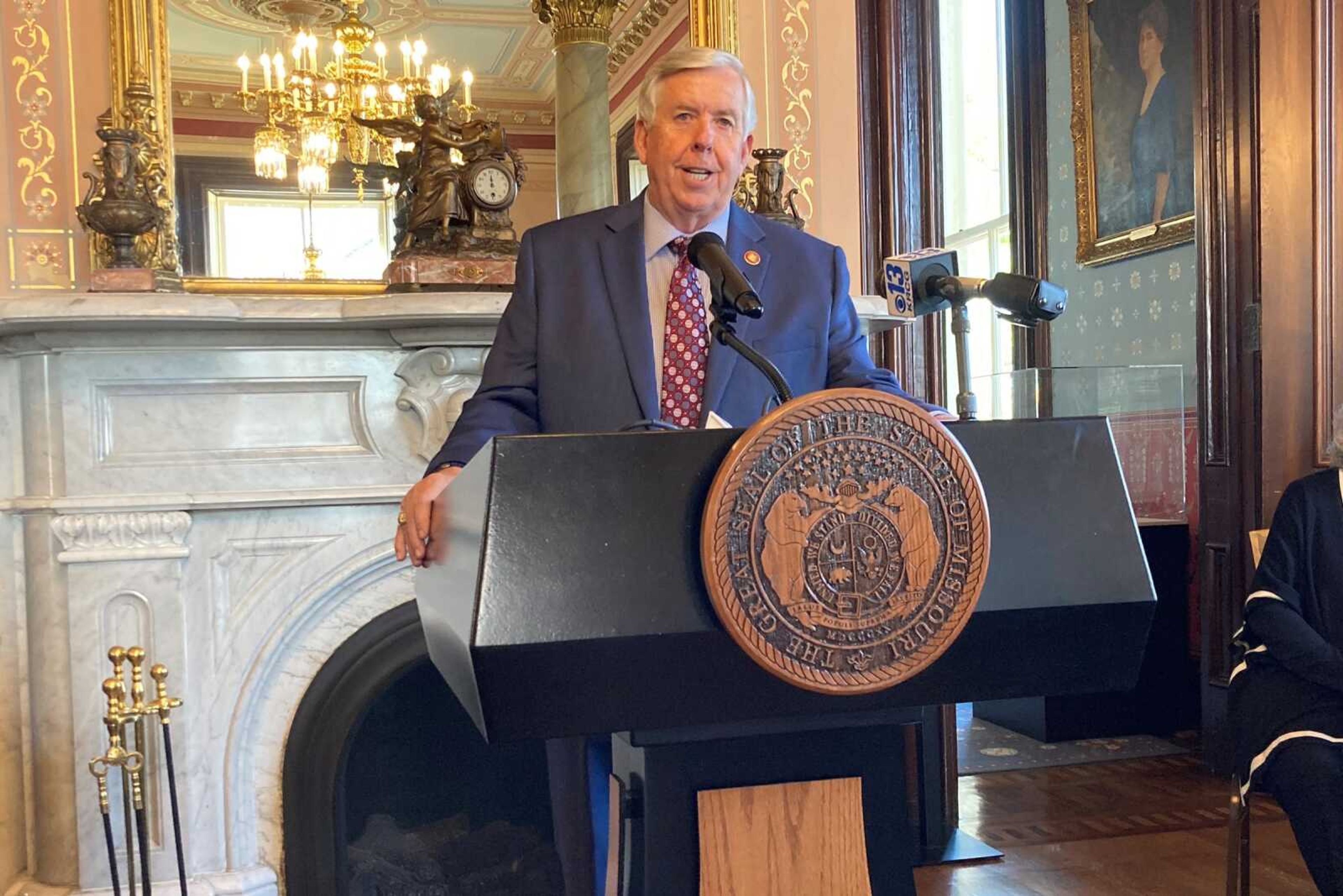 Gov. Mike Parson speaks to members of the media Thursday at the Governor's Mansion in Jefferson City, Missouri, as part of the annual Missouri Press Association Day at the Capitol. Parson said the U.S. needs to impose "much more severe" sanctions on Russia over its war against Ukraine.