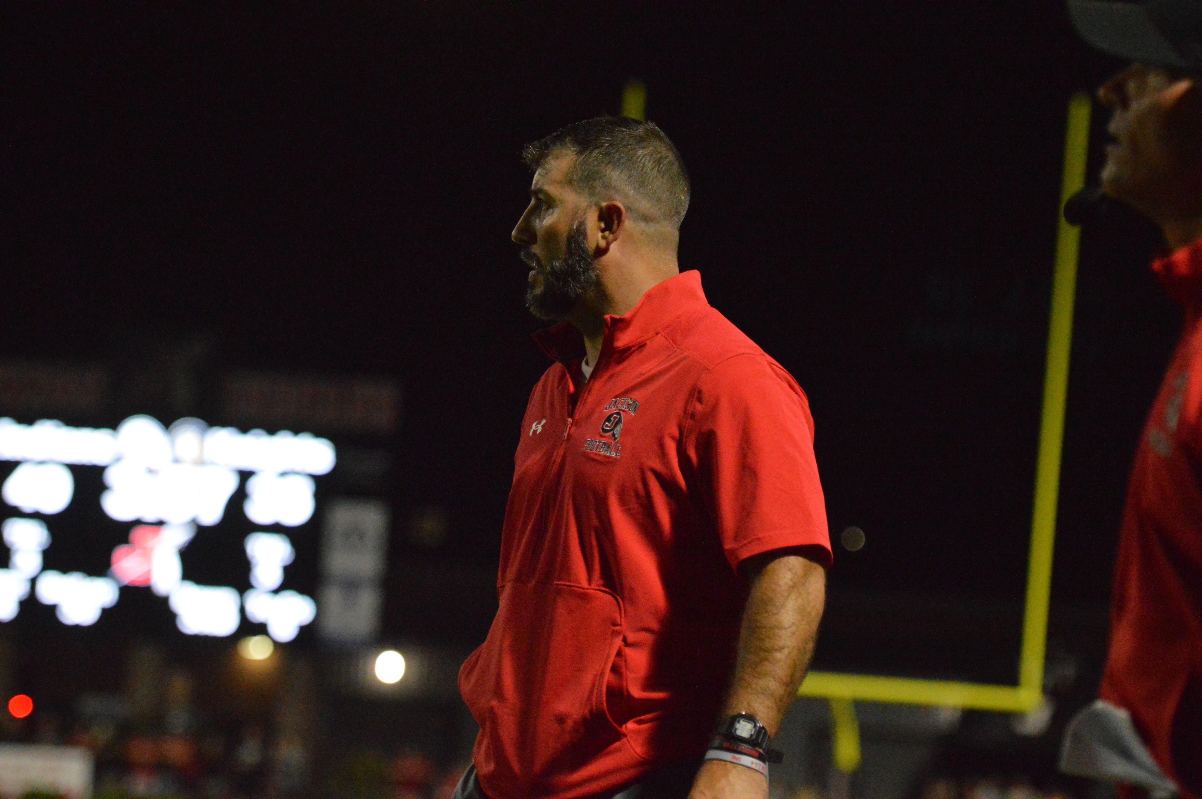 Jackson second-year head coach Ryan Nesbitt on the sideline against Farmington in the home opener on Friday, Sept. 20.