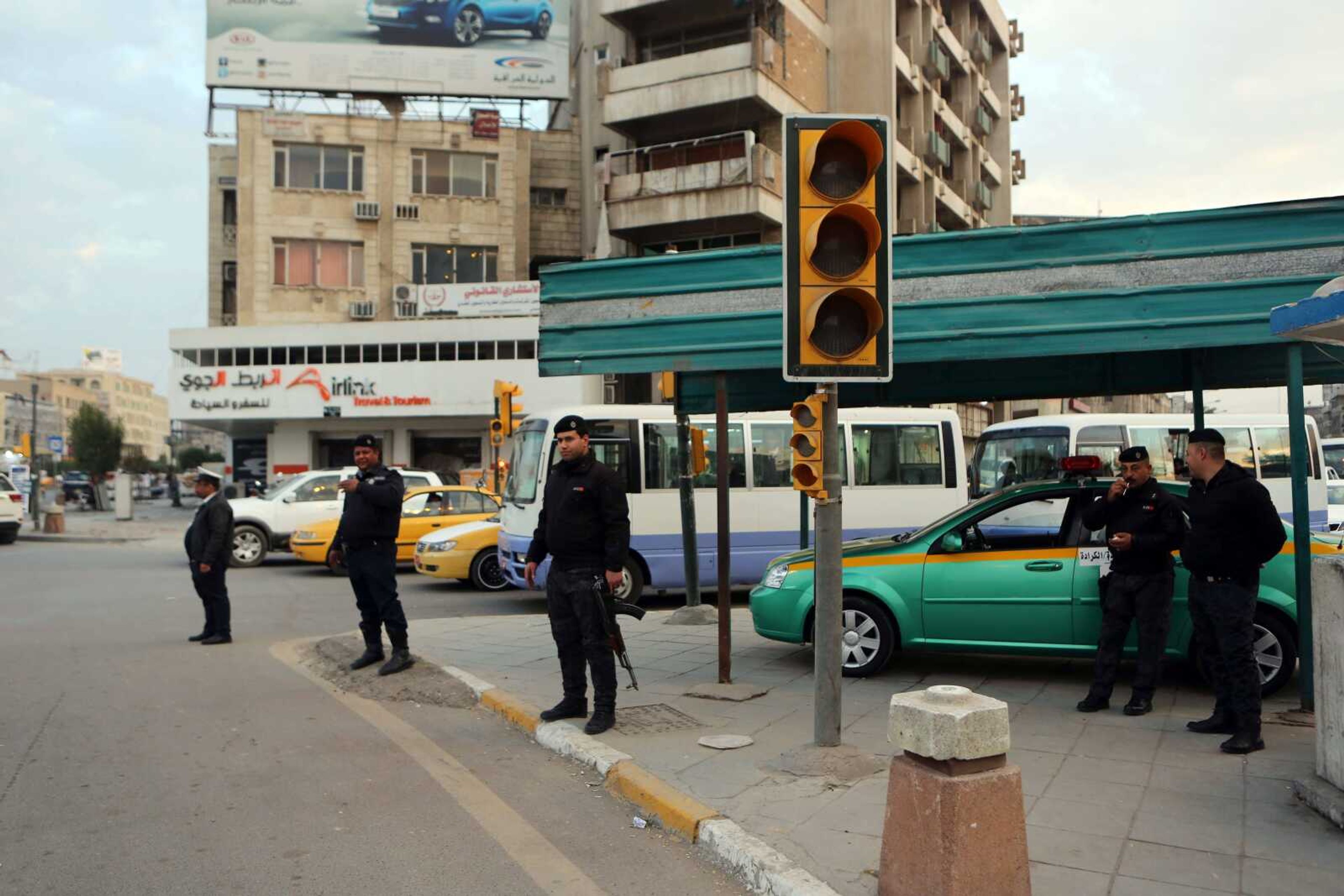 Iraqi security forces fanned out Monday across the Baghdad neighborhood where three Americans were kidnapped over the weekend. They closed streets and conducted house-to-house searches. (Khalid Mohammed ~ Associated Press)