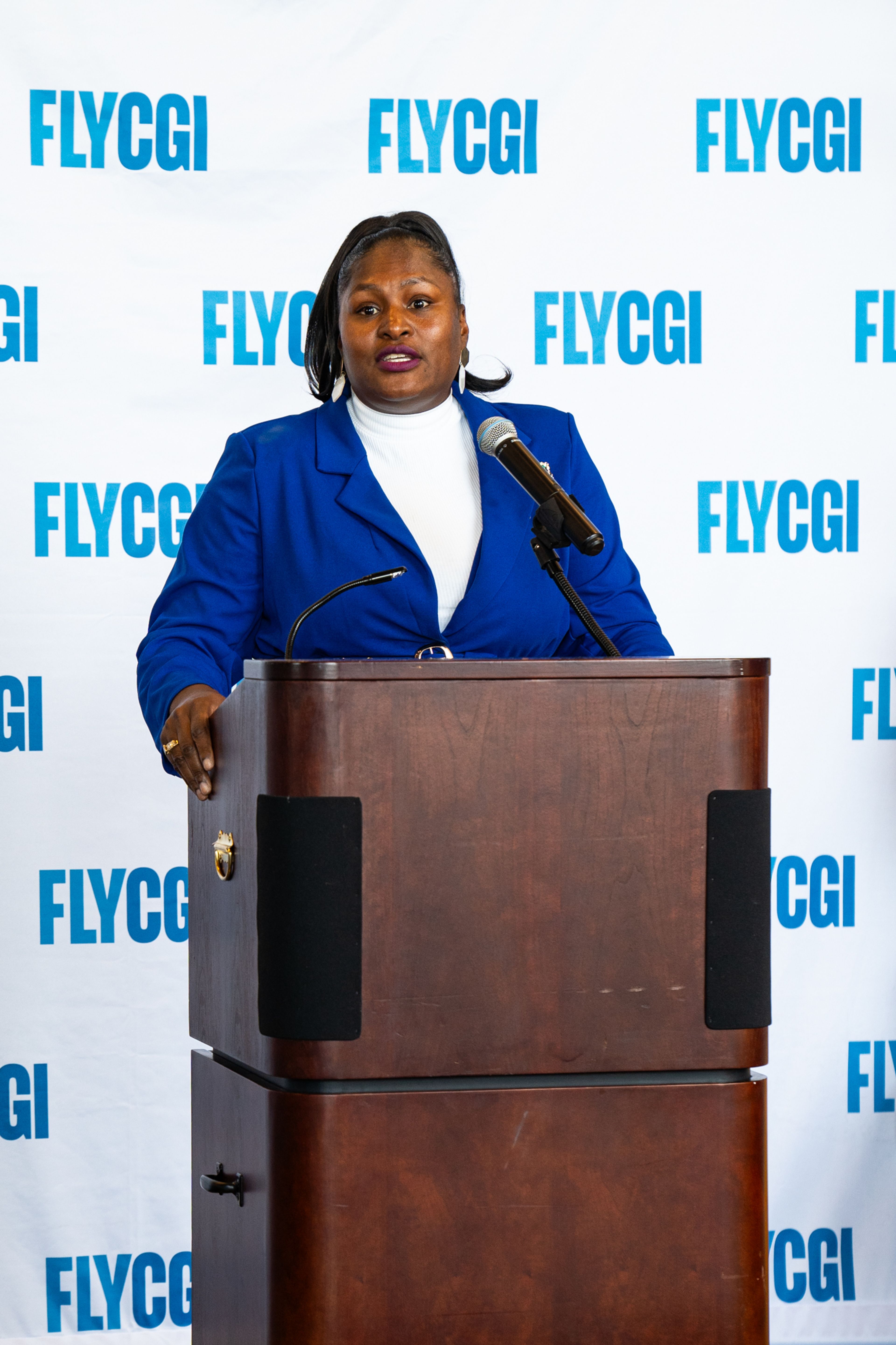 Former airport manager Katrina Amos speaks on building the terminal to the attendees at a press conference on Tuesday, Oct. 1 in the new Cape Girardeau Regional Airport terminal.