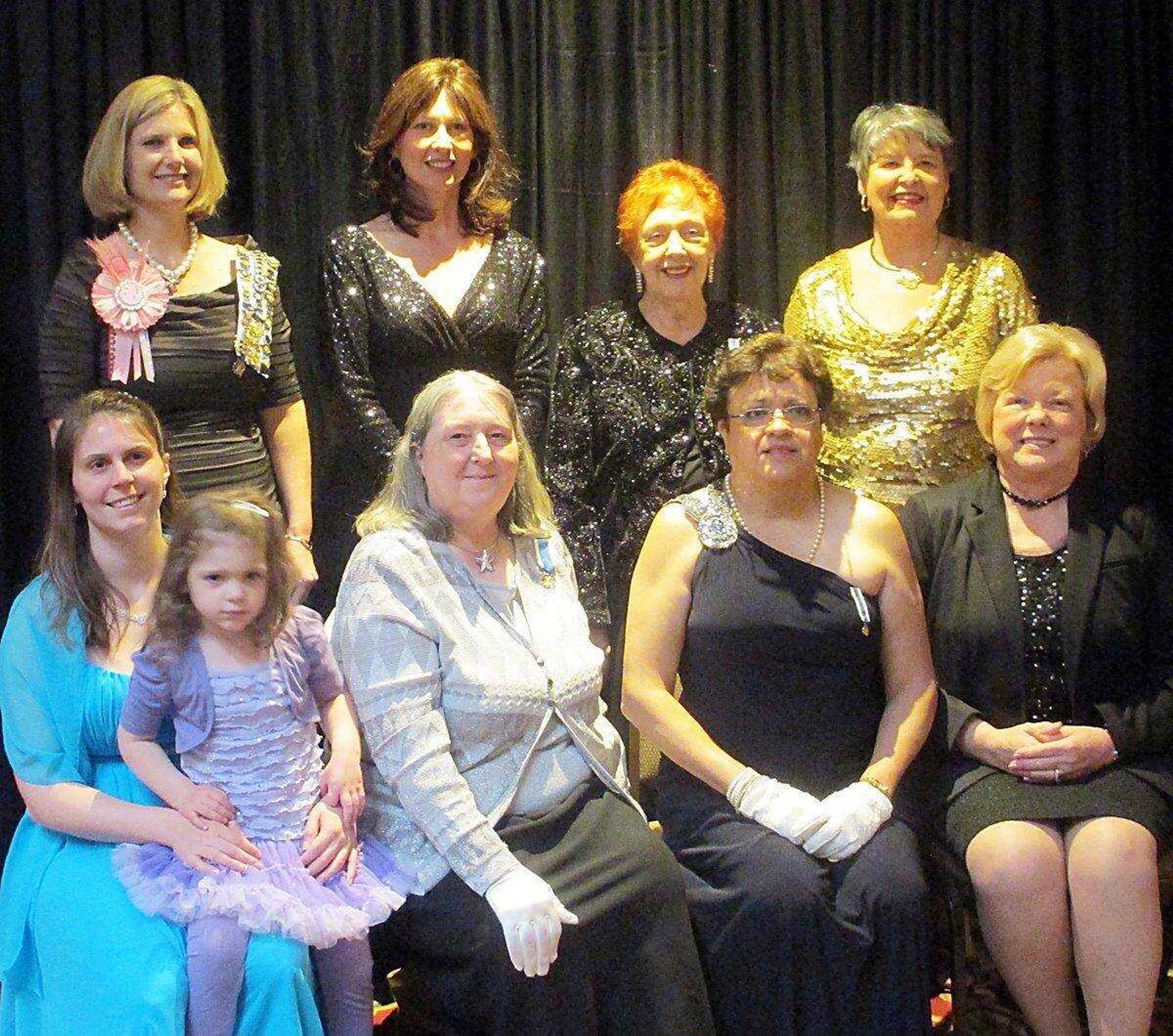 Beth Biri, historian holding daughter, Isabella Biri, member Children of the American Revolution, Pamela Johnson, chapter regent, Cheryl Cook, &#202;treasurer, Linda Hutson, parlimentarian. Standing from left: Morgan Lake, national chairman junior membership, state vice regent and chapter registrar, Lorilee Short, corresponding secretary, Shirley Young, publicity, Gwen Nussbaum, recording secretary. Kelsey Tuschhoff, page, was present but not in the photograph.