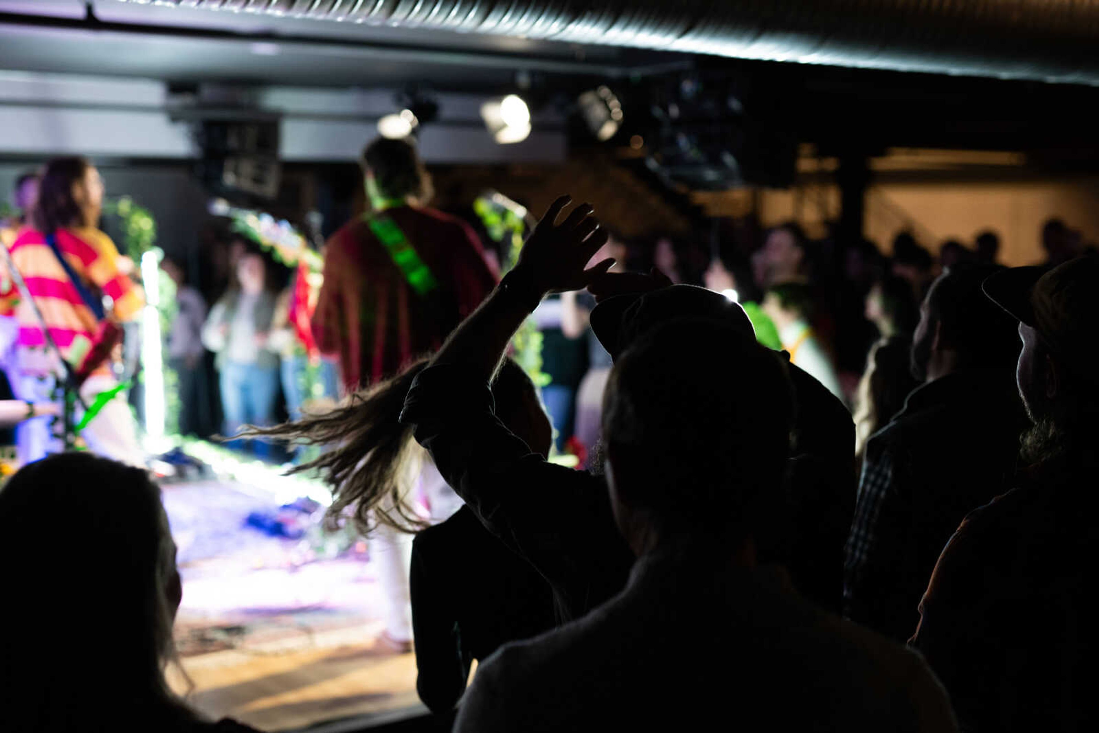 Fans move to the music at Scout Hall during a performance by Dawson Hollow.