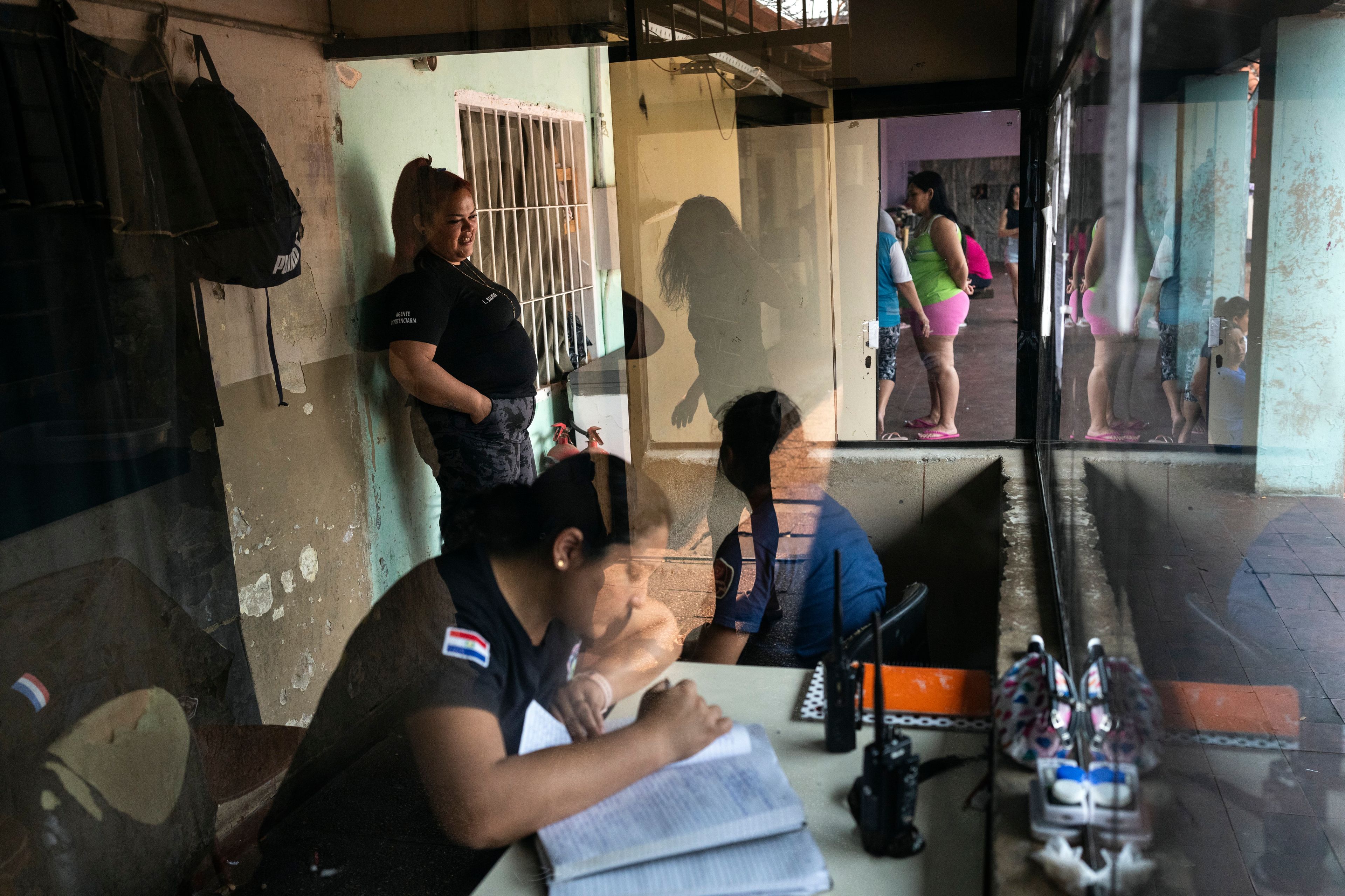 Security guards work at a checkpoint inside the Buen Pastor women's prison in Asuncion, Paraguay, Monday, Sept. 2, 2024. (AP Photo/Rodrigo Abd)