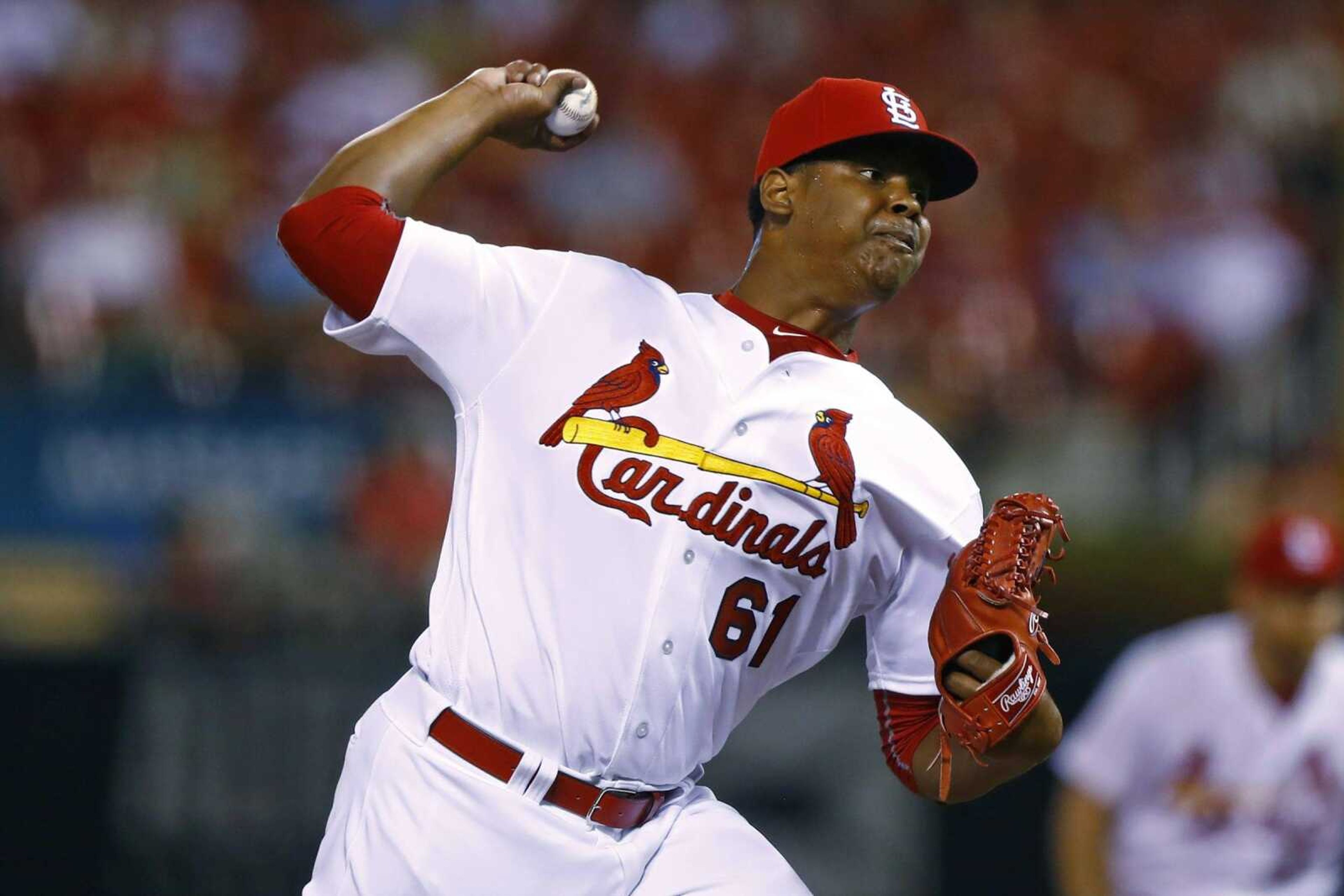 St. Louis Cardinals reliever Alex Reyes, making his major league debut, pitches during the ninth inning of a baseball game against the Cincinnati Reds, Tuesday, Aug. 9, 2016, in St. Louis. The Reds won 7-4. (AP Photo/Billy Hurst)