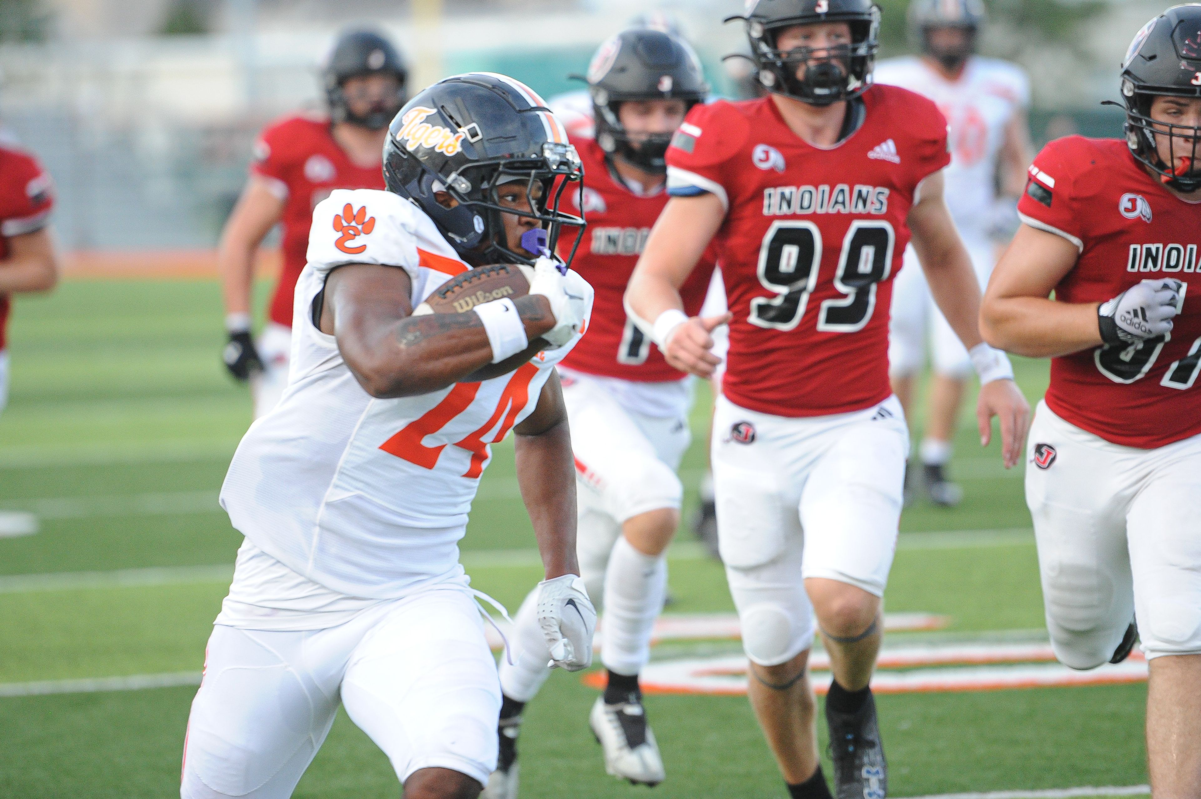 Edwardsville's Steven Moore Jr. sprints down the sideline during a Saturday, September 14, 2024 game between the Edwardsville Tigers and the Jackson Indians at Edwardsville High School in Edwardsville, Ill. Edwardsville defeated Jackson, 41-7.