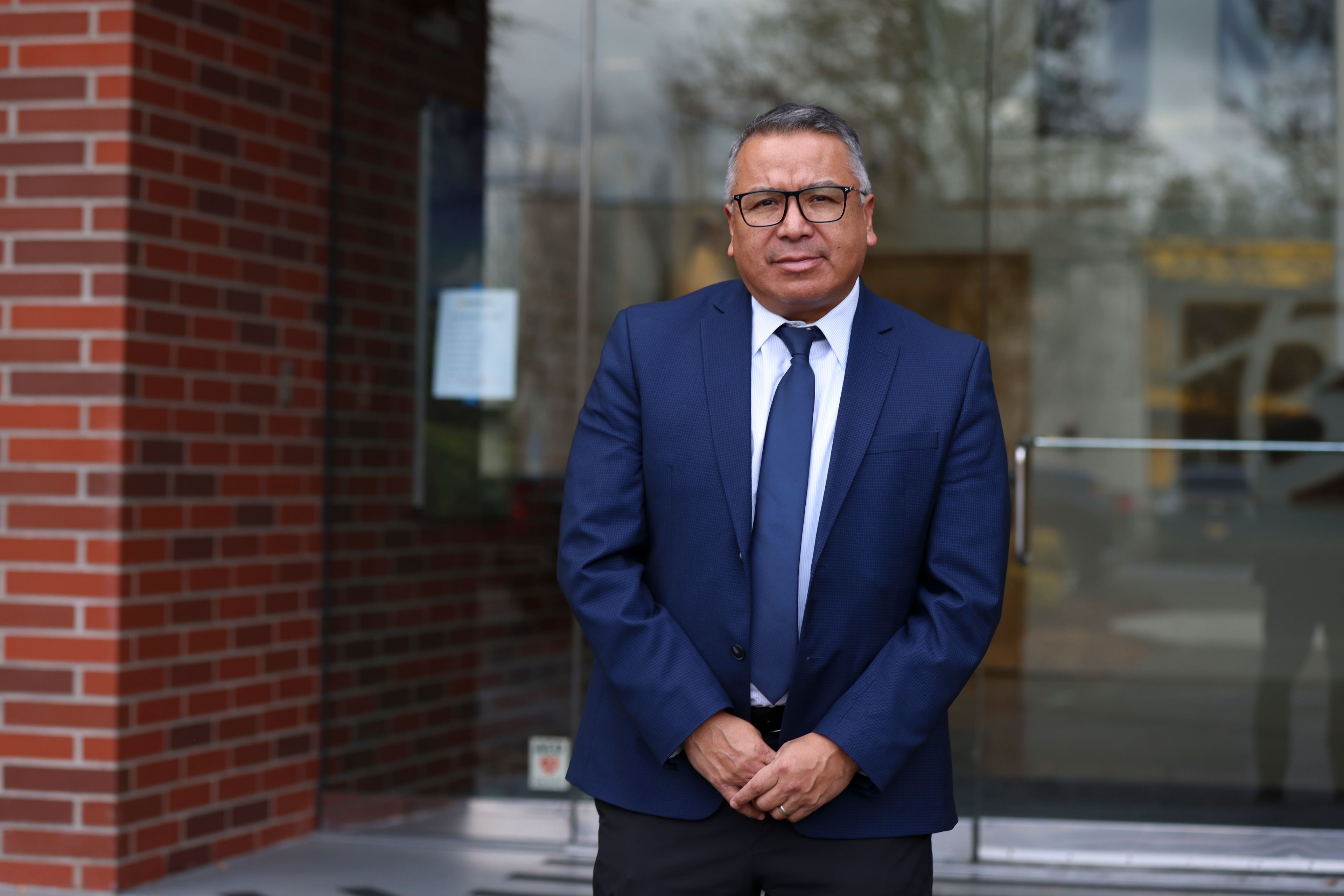 Gustavo Balderas, superintendent of Beaverton School District, stands for a photo outside of the Beaverton school district administrative office in Beaverton, Ore., Monday, Nov. 25, 2024. (AP Photo/Amanda Loman)