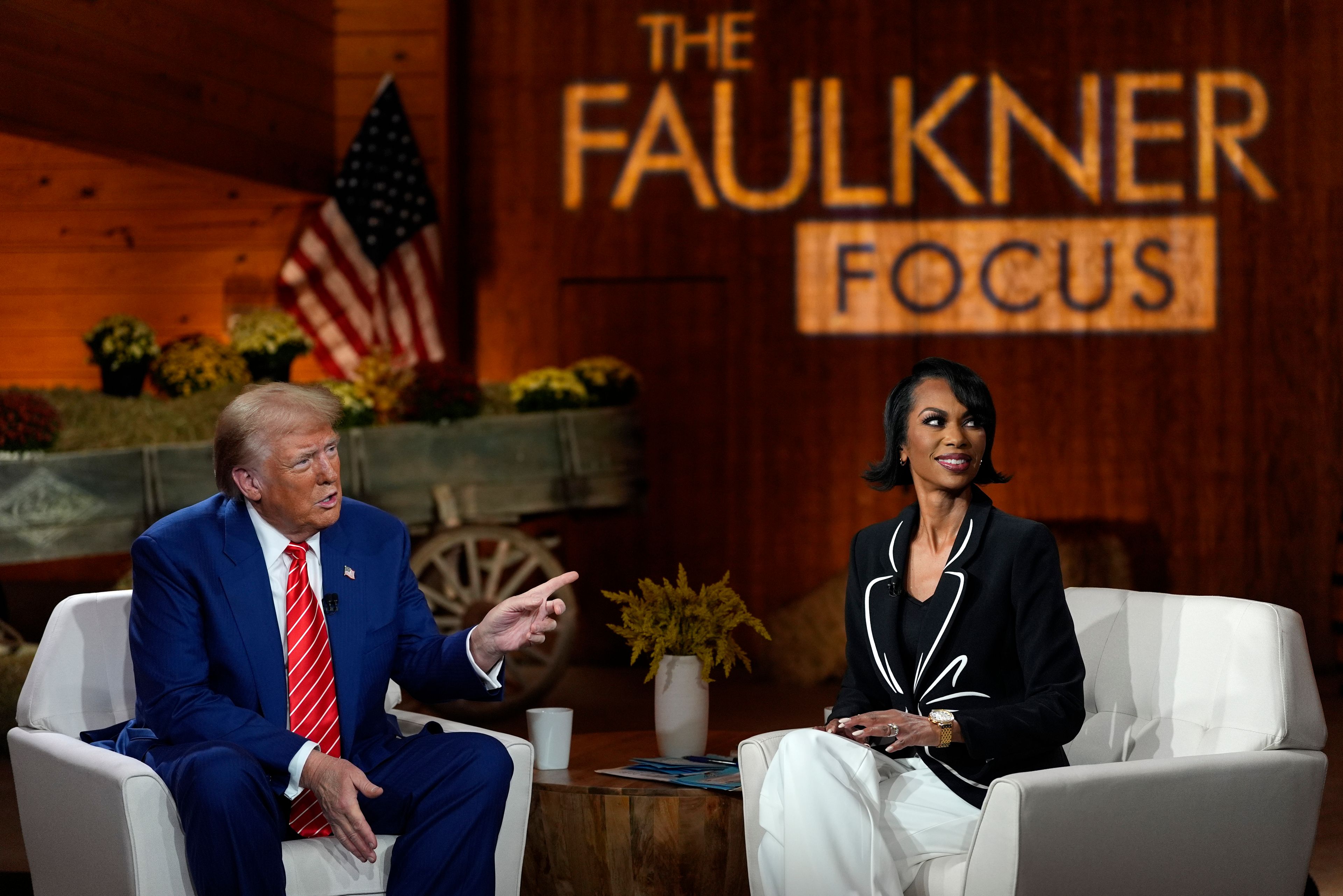 Republican presidential nominee former President Donald Trump speaks during a break in a Fox News town hall with Harris Faulkner at The Reid Barn, Tuesday, Oct. 15, 2024, in Cumming, Ga. (AP Photo/Julia Demaree Nikhinson)