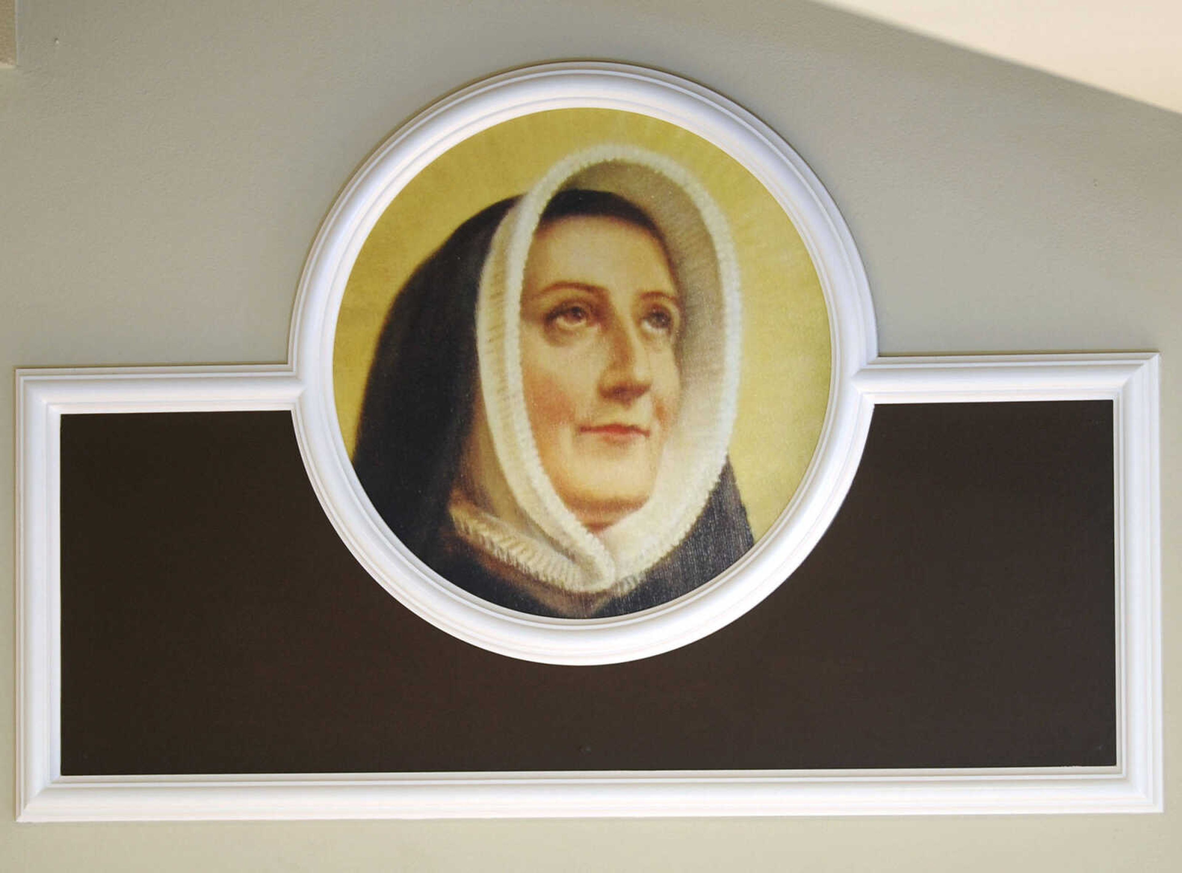 A three-foot reproduction of St. Rose Philippine Duchesne, Diocesan Patron Saint, is located above the statue of Mary in St. Mary Cathedral.