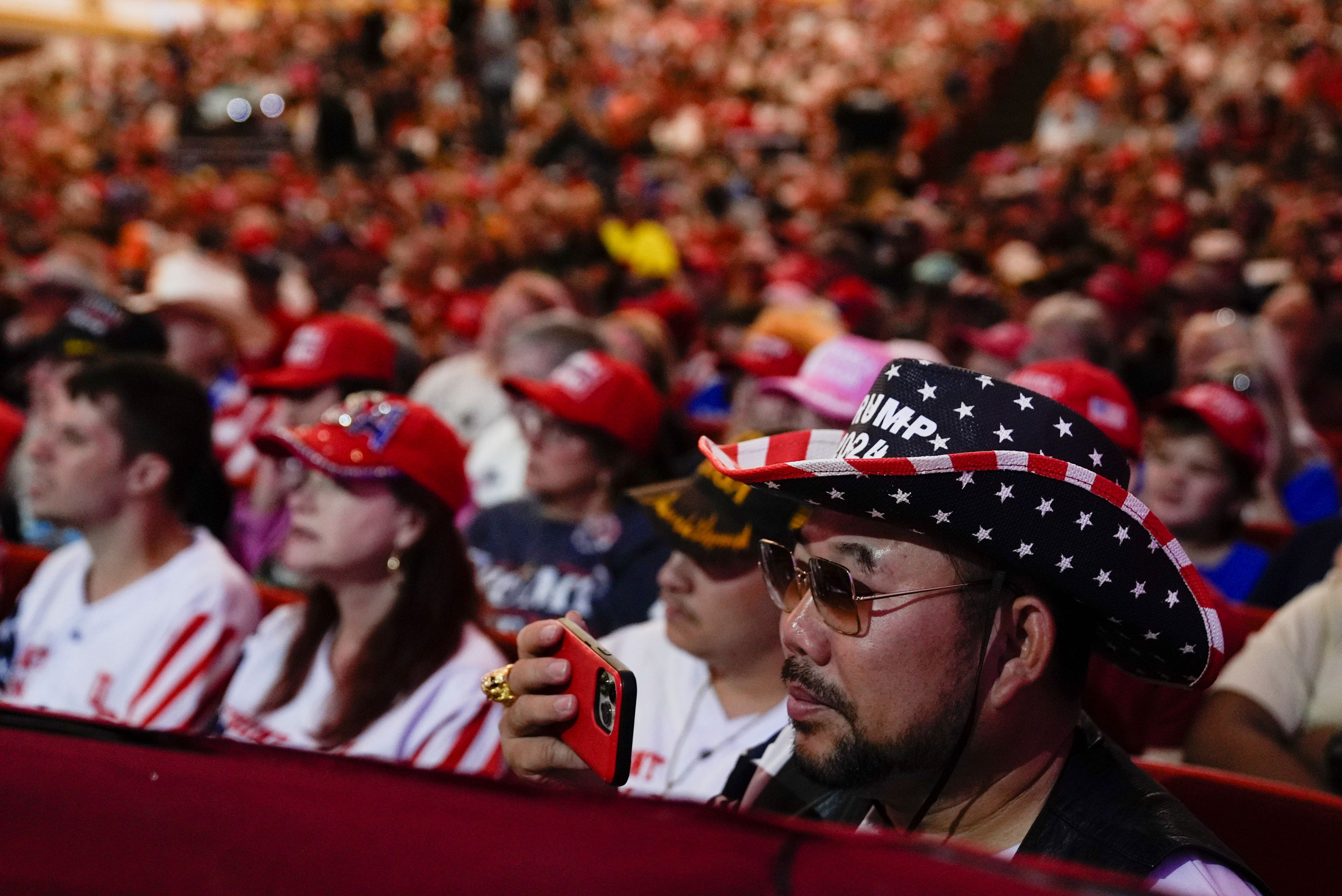 Supporters arrive before Republican presidential nominee former President Donald Trump speaks at a campaign rally in Asheville, N.C., Wednesday, Aug. 14, 2024. (AP Photo/Matt Rourke)