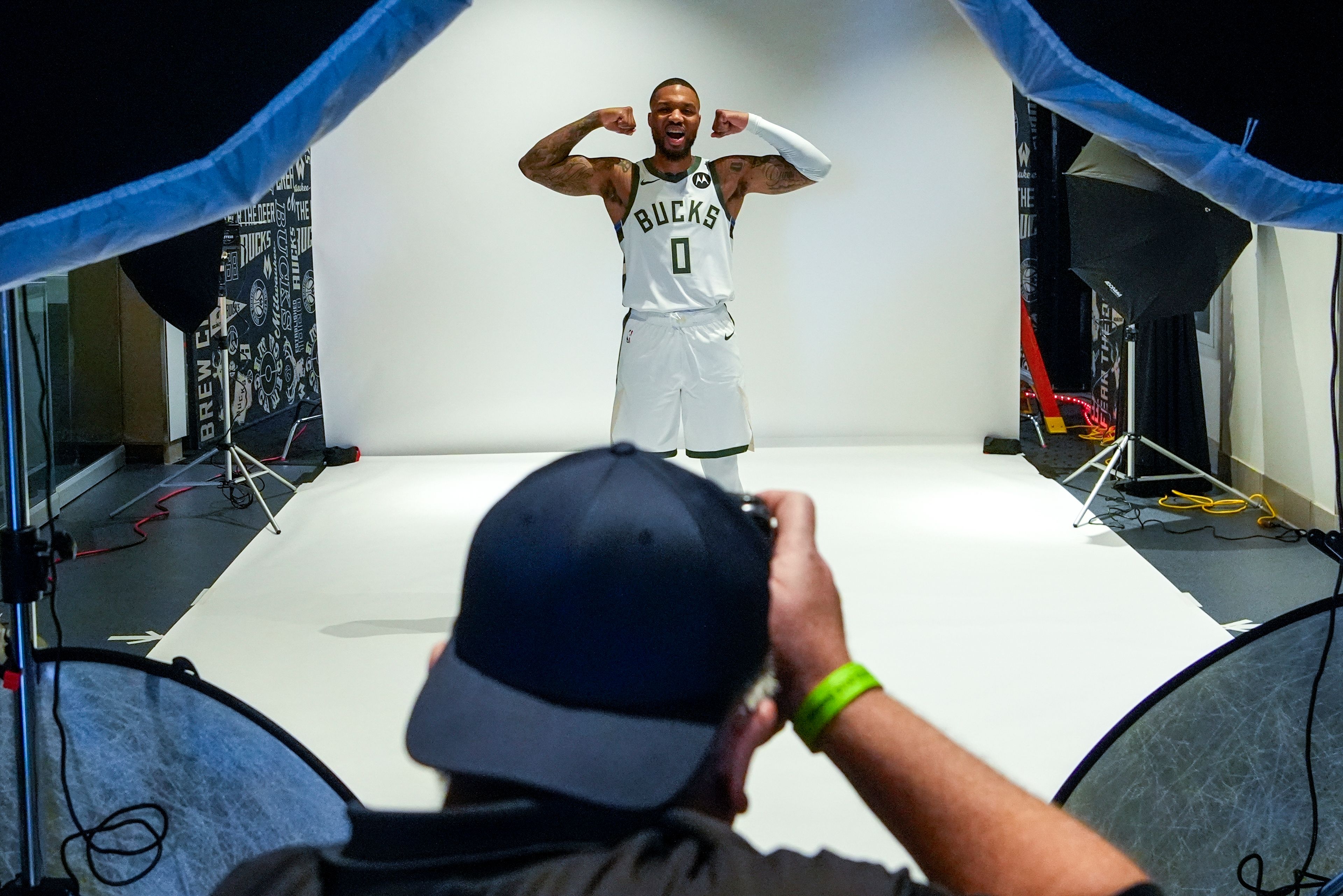 Milwaukeee Bucks' Damian Lillard poses for photos during the NBA basketball team's media day Monday, Sept. 30, 2024, in Milwaukee. (AP Photo/Morry Gash)