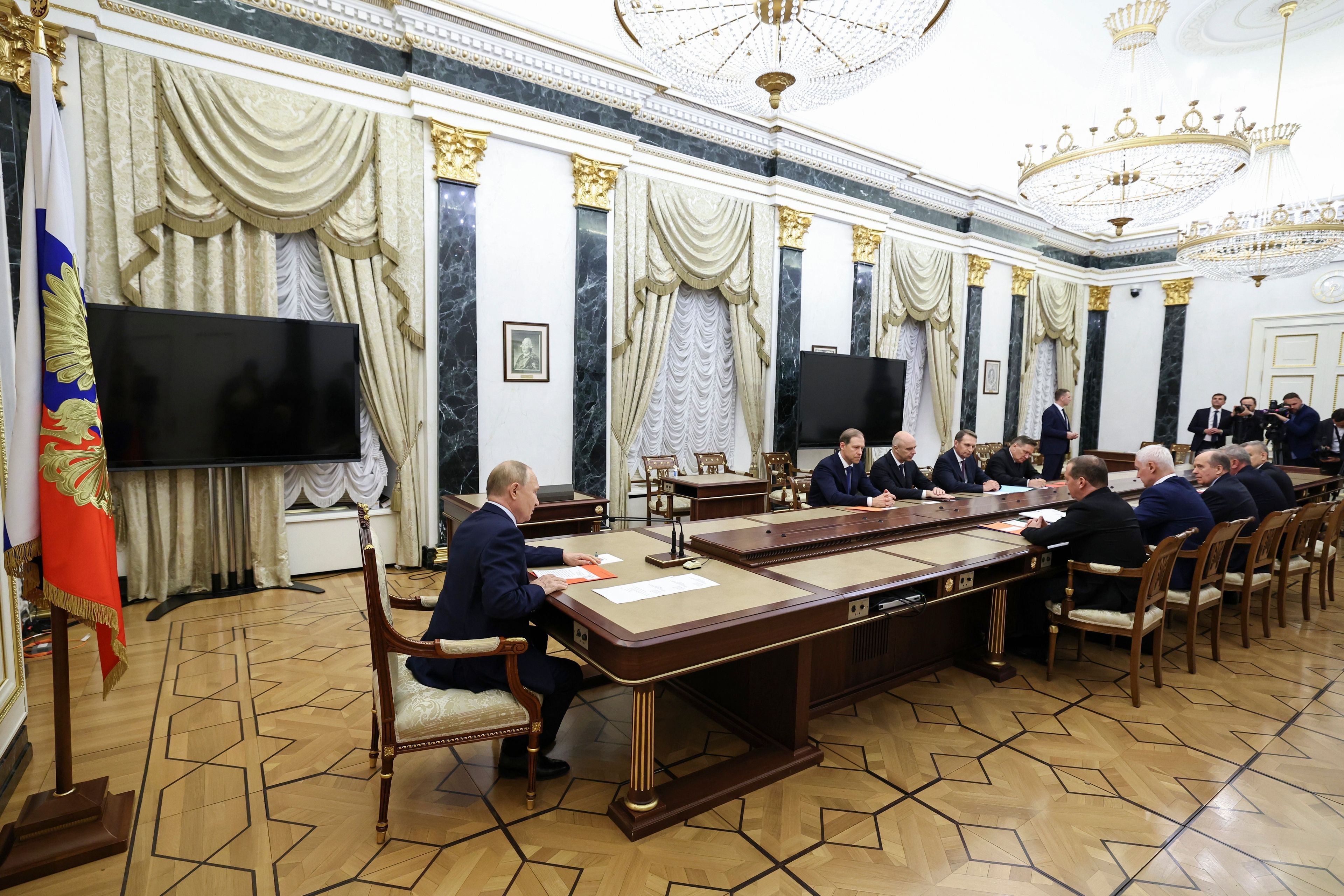 FILE - Russian President Vladimir Putin, left, speaks at the Security Council meeting on nuclear deterrence at the Kremlin in Moscow, Russia, Wednesday, Sept. 25, 2024. (Alexander Kazakov, Sputnik, Kremlin Pool Photo via AP, File)