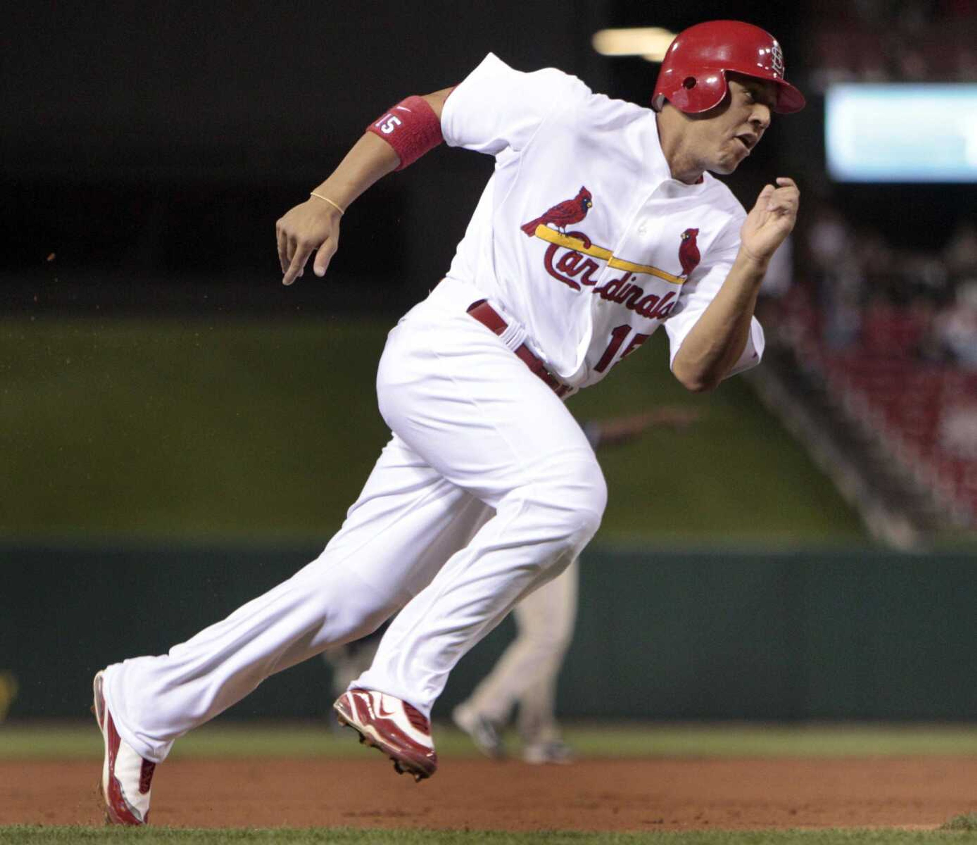 St. Louis Cardinals right fielder Jon Jay rounds third and heads for home to score on as single by Matt Holliday during the first inning of a baseball game against the San Diego Padres Thursday, Sept. 16, 2010, in St. Louis. (AP Photo/Jeff Roberson)