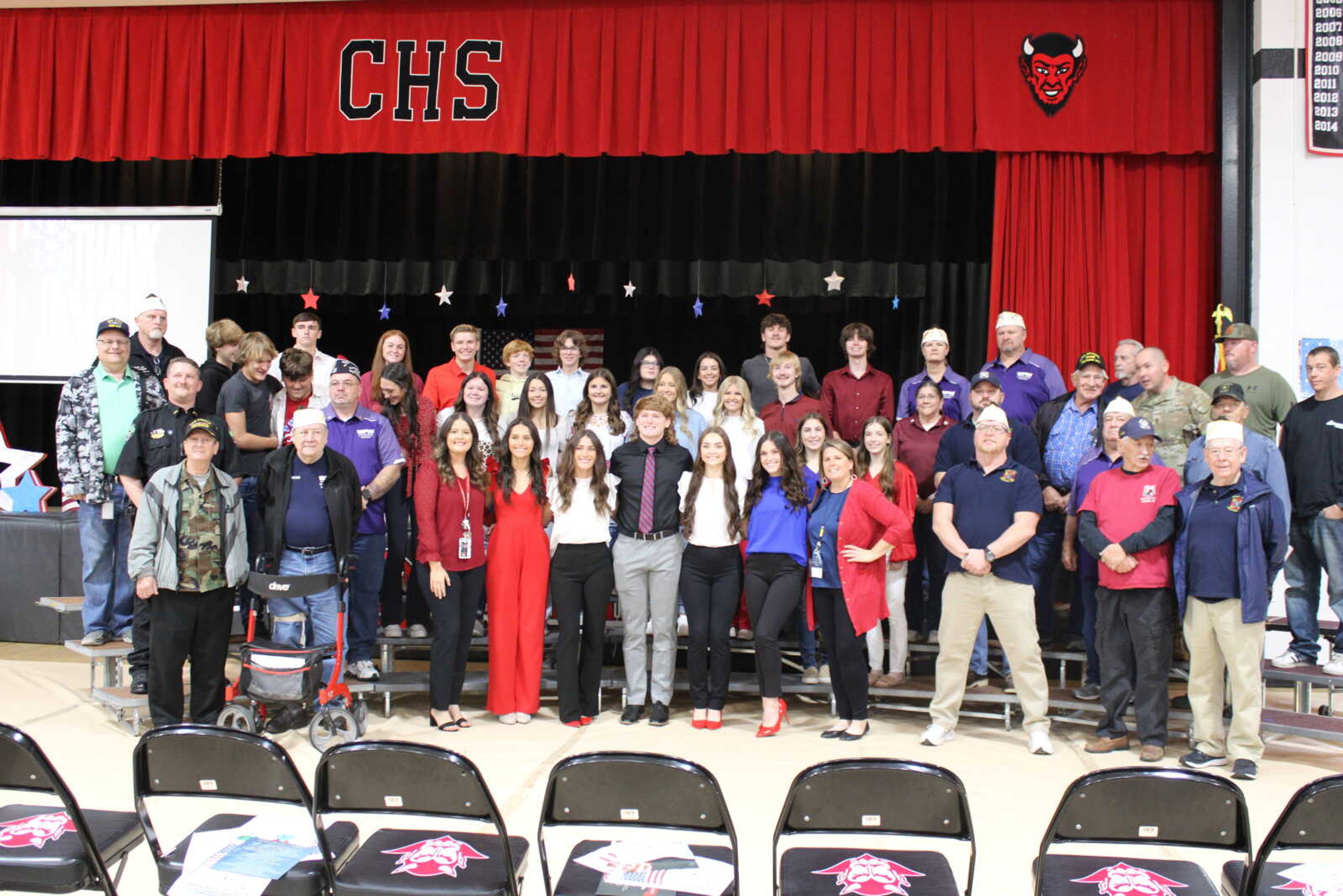 Chaffee student council members and veterans pose for a photo after the assembly