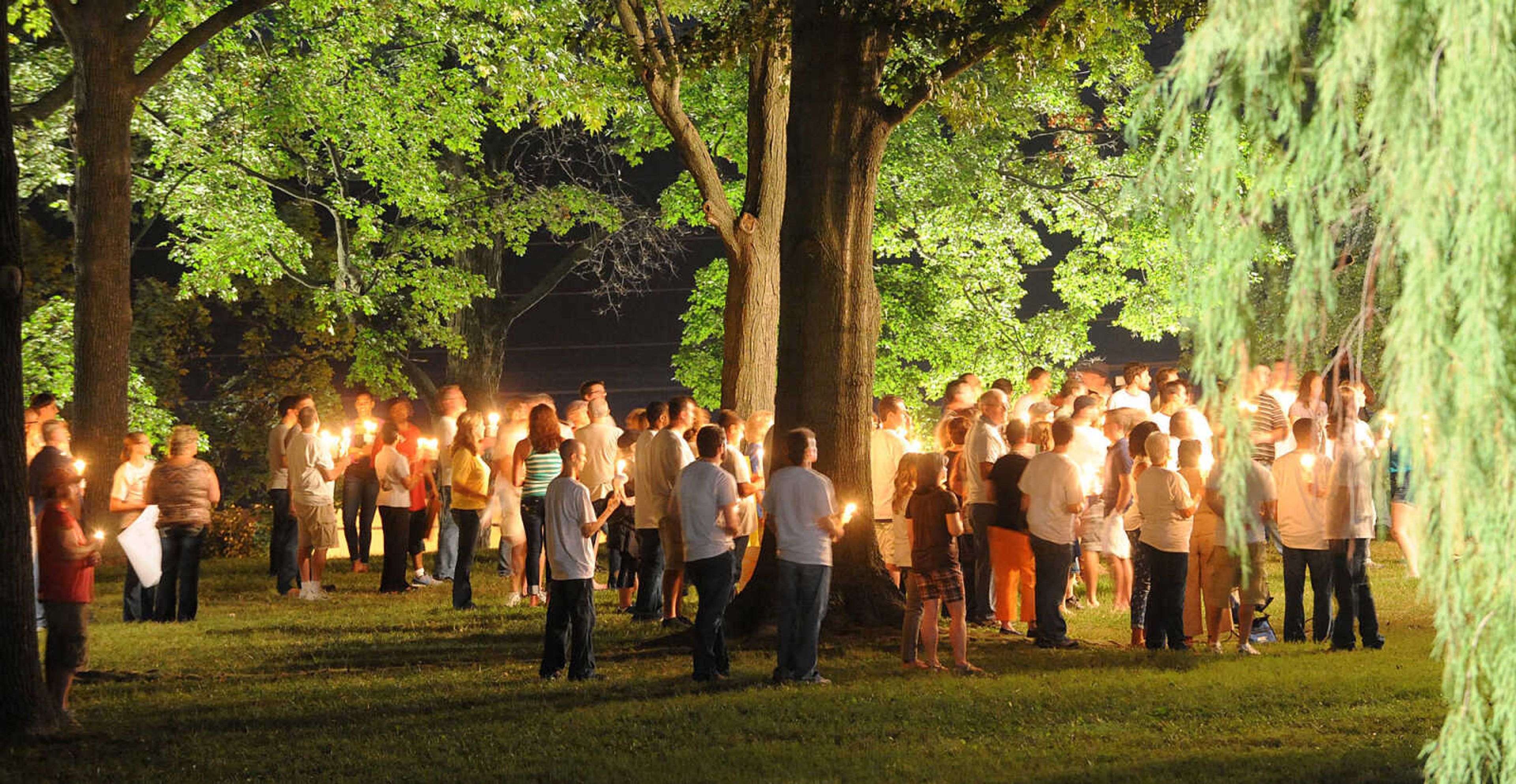 LAURA SIMON ~ lsimon@semissourian.com

Extras in the movie "Gone Girl" fill the lawn of the Common Pleas Courthouse, Thursday, Oct. 3, 2013, while filming a candlelight vigil scene.