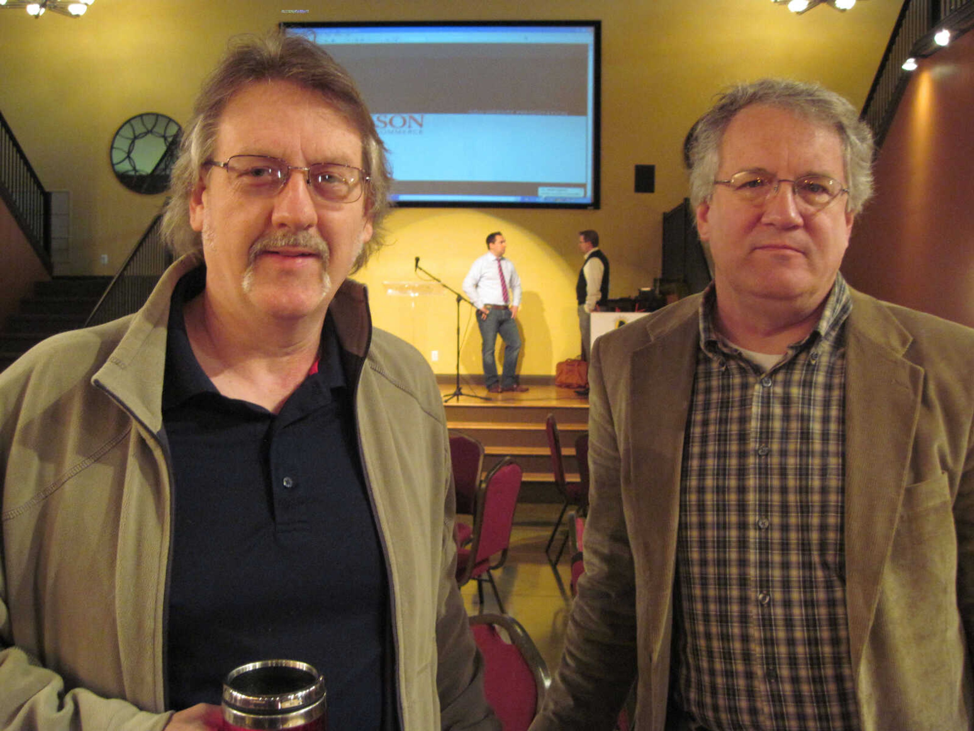 Wes Wade and Tom Ludwig attend the Jackson Chamber of Commerce Business Breakfast at Creative Edge on Friday, April 9, 2010.