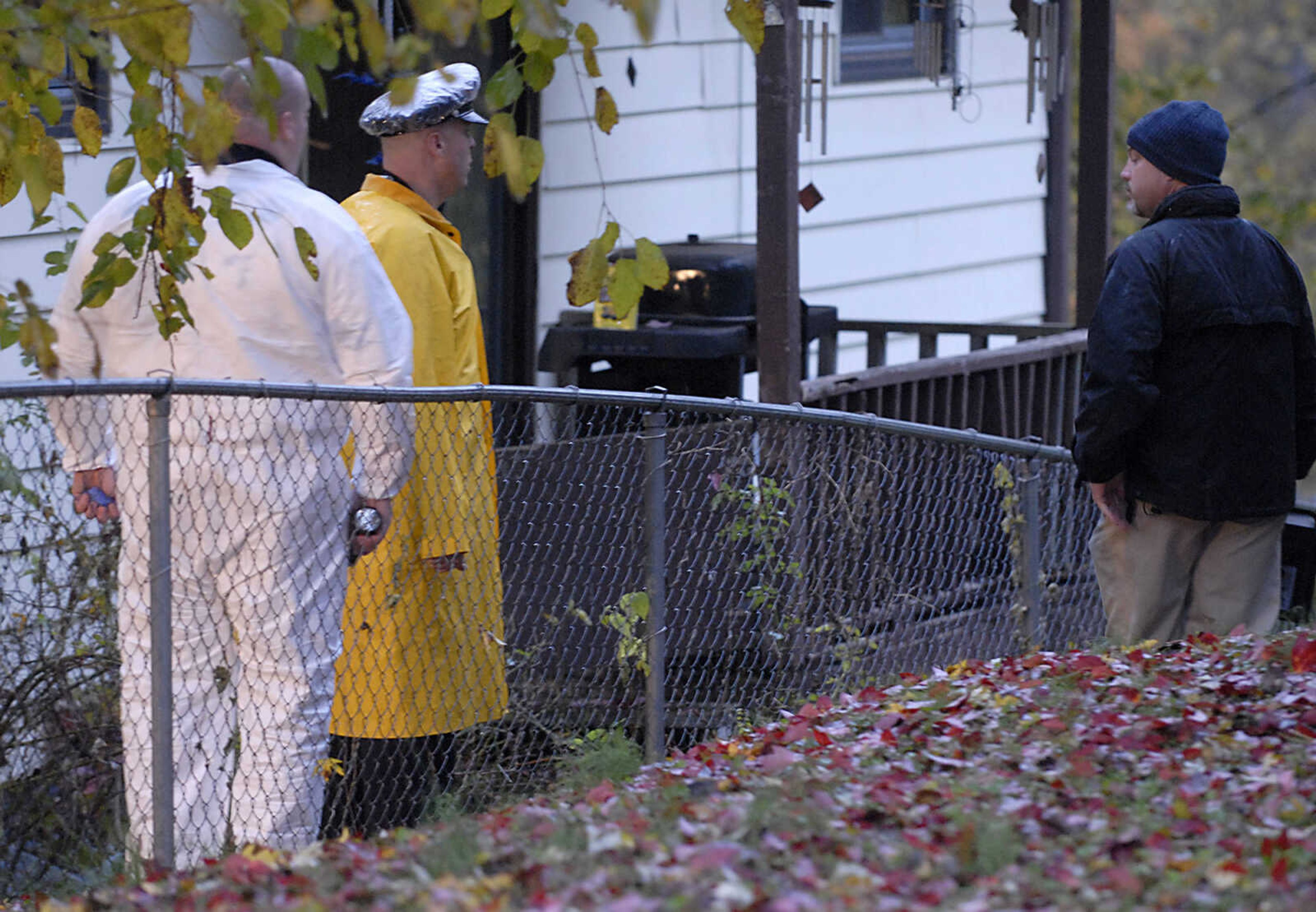 KIT DOYLE ~ kdoyle@semissourian.com
Authorities check the perimeter of 1224 N. Missouri St. Tuesday morning, October 27, 2009, in Cape Girardeau.  There was a double homicide at the residence early Tuesday morning.