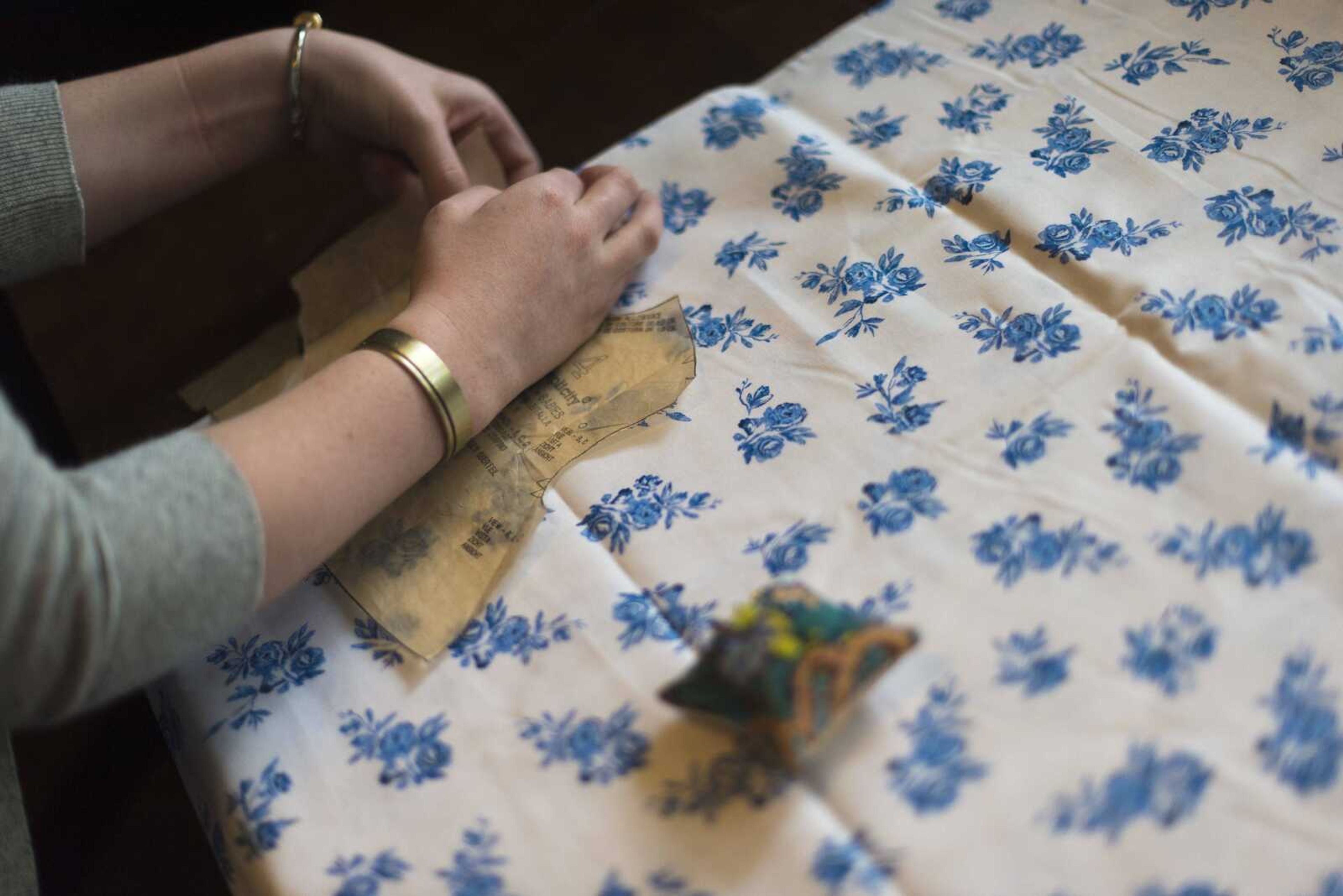 Cutline Email/Stock:Photos by ANDREW J. WHITAKER ~Cutline Email/Stock:awhitaker@semissourian.comFashion description:Emily Colbert lines up fabric to sew together on her grandmother's sewing machine in her kitchen. Colbert has a fashion blog called Rag + Relic where she hand crafts.