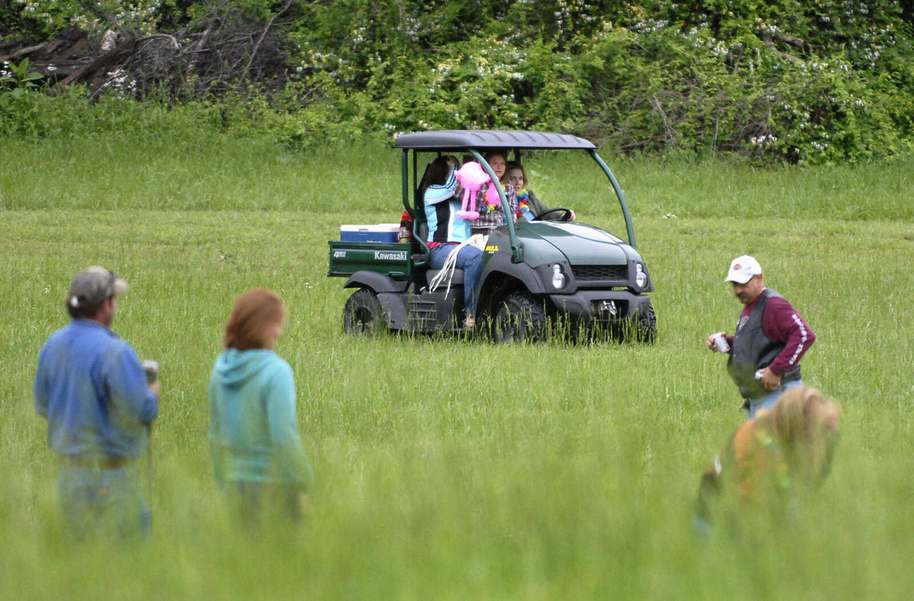 KRISTIN EBERTS ~ keberts@semissourian.com

The beverage cart brings refreshments to golfers during the Kow Pasture Klassic at Schlinder's Tavern in New Hamburg, Mo., on Saturday, May 14, 2011. Proceeds from the event benefit the Kenny Rogers Children's Center and the Missouri Veterans Home.