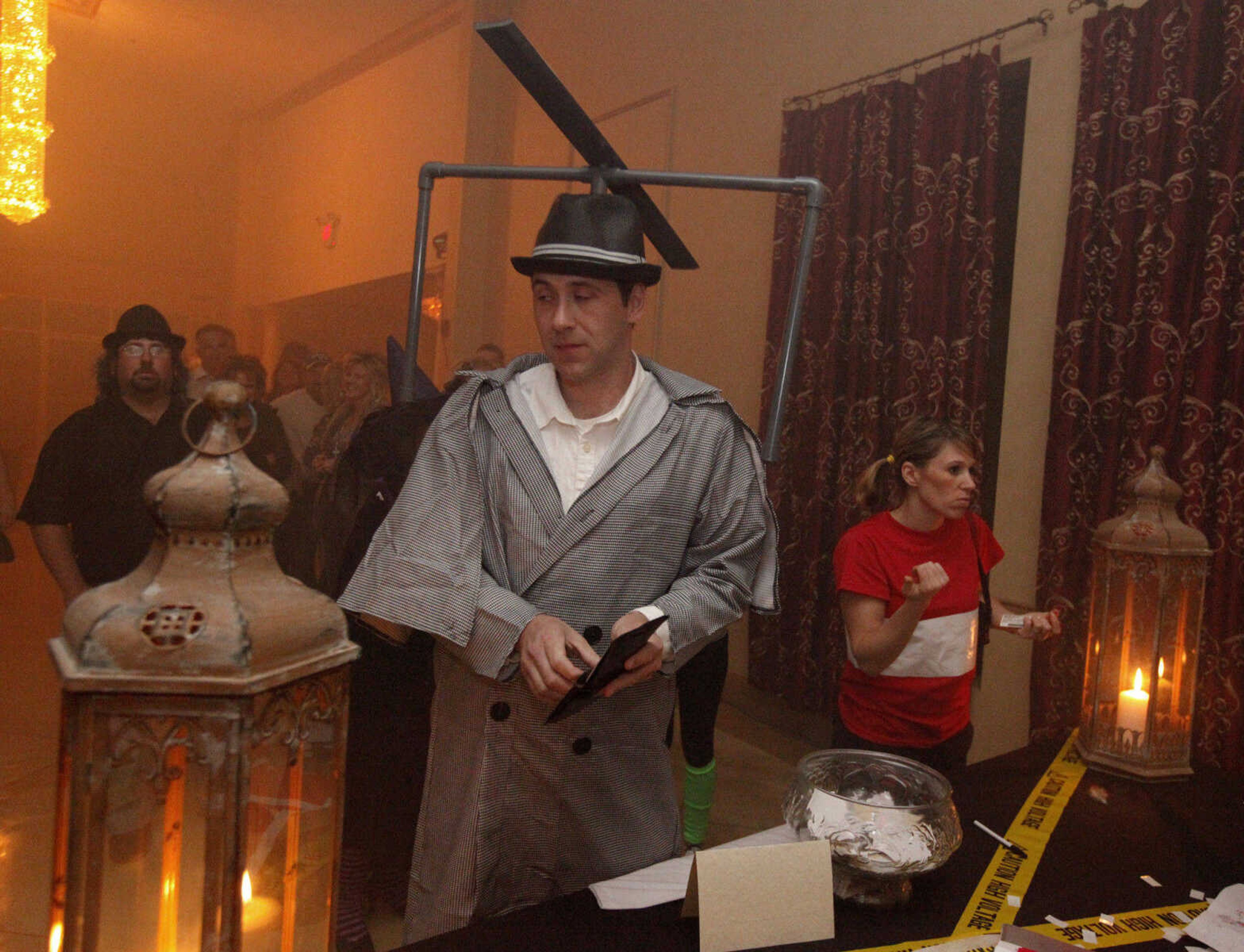 CHRIS MACKLER ~ photos@semissourian.com

Ben Kyle dressed as Inspector Gadget at The Venue's Mega Halloween Bash in Cape Girardeau on Saturday, Oct. 30, 2010. According to The Venue owner and operator Mike Jessup, 300 pre-sale tickets were sold for the bash, which was set up as an 80's theme party.