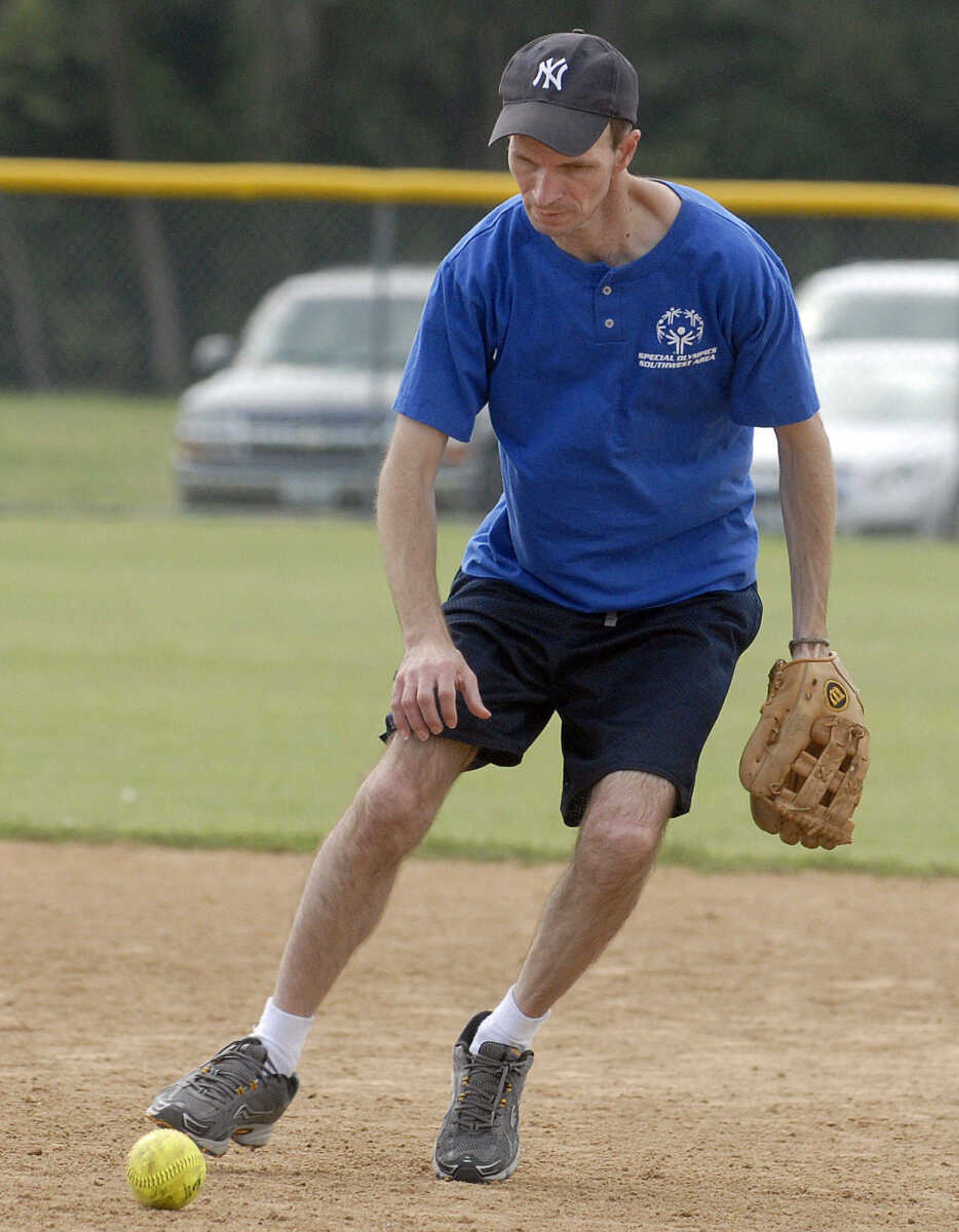 LAURA SIMON ~ lsimon@semissourian.com
The SW Sharks Scott Brown fields a grounder Saturday, August 13, 2011 during the Special Olympics State Outdoor Championship at Shawnee Sports Complex in Cape Girardeau.