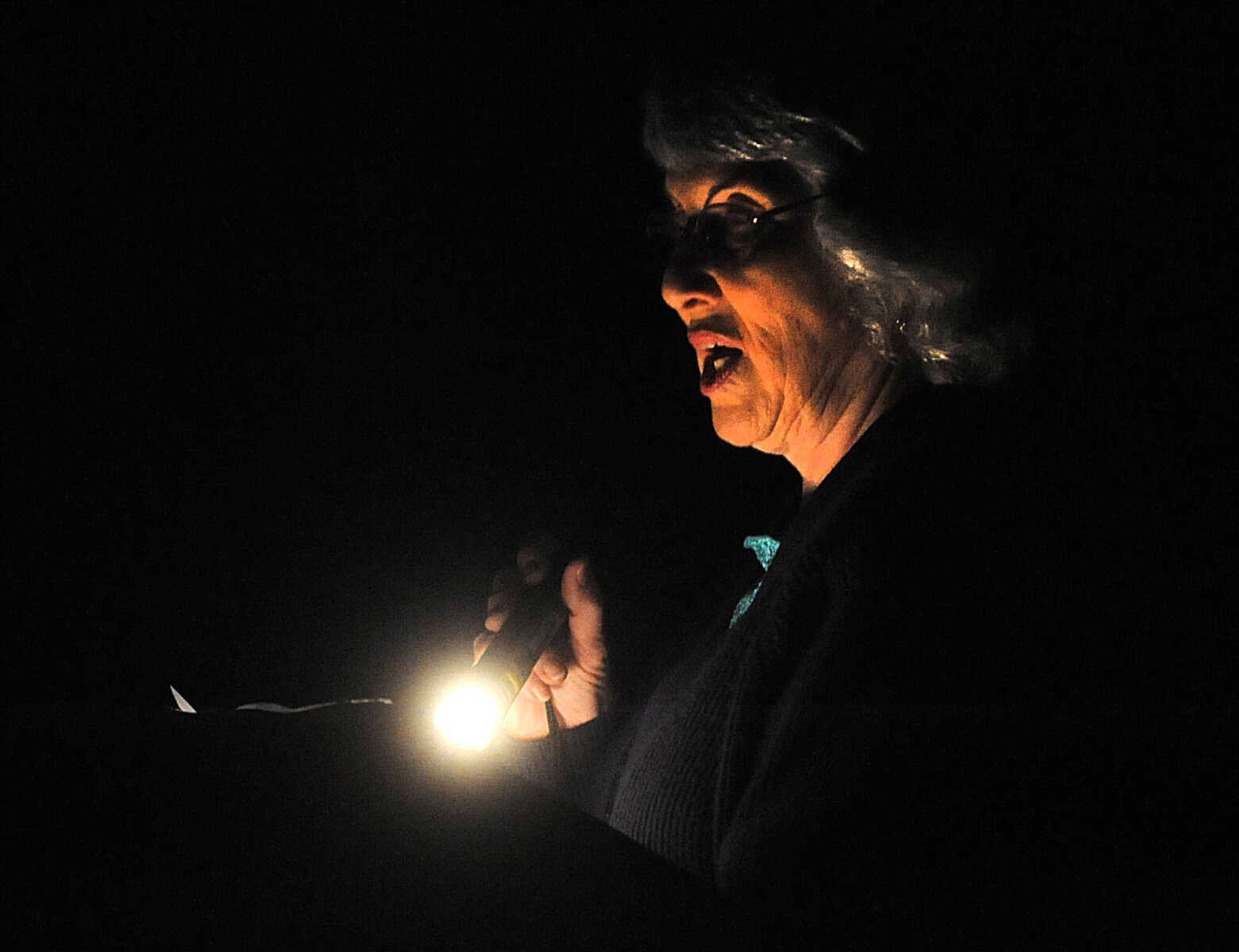 LAURA SIMON ~ lsimon@semissourian.com

Nancy Cook leads parishioners in "I Love the Lord" during Burfordville Baptist Church's Easter sunrise service along the bank of the Whitewater River Sunday morning, March 31, 2013 at Bollinger Mill State Historic Site. Around 60 people were in attendance for the service.