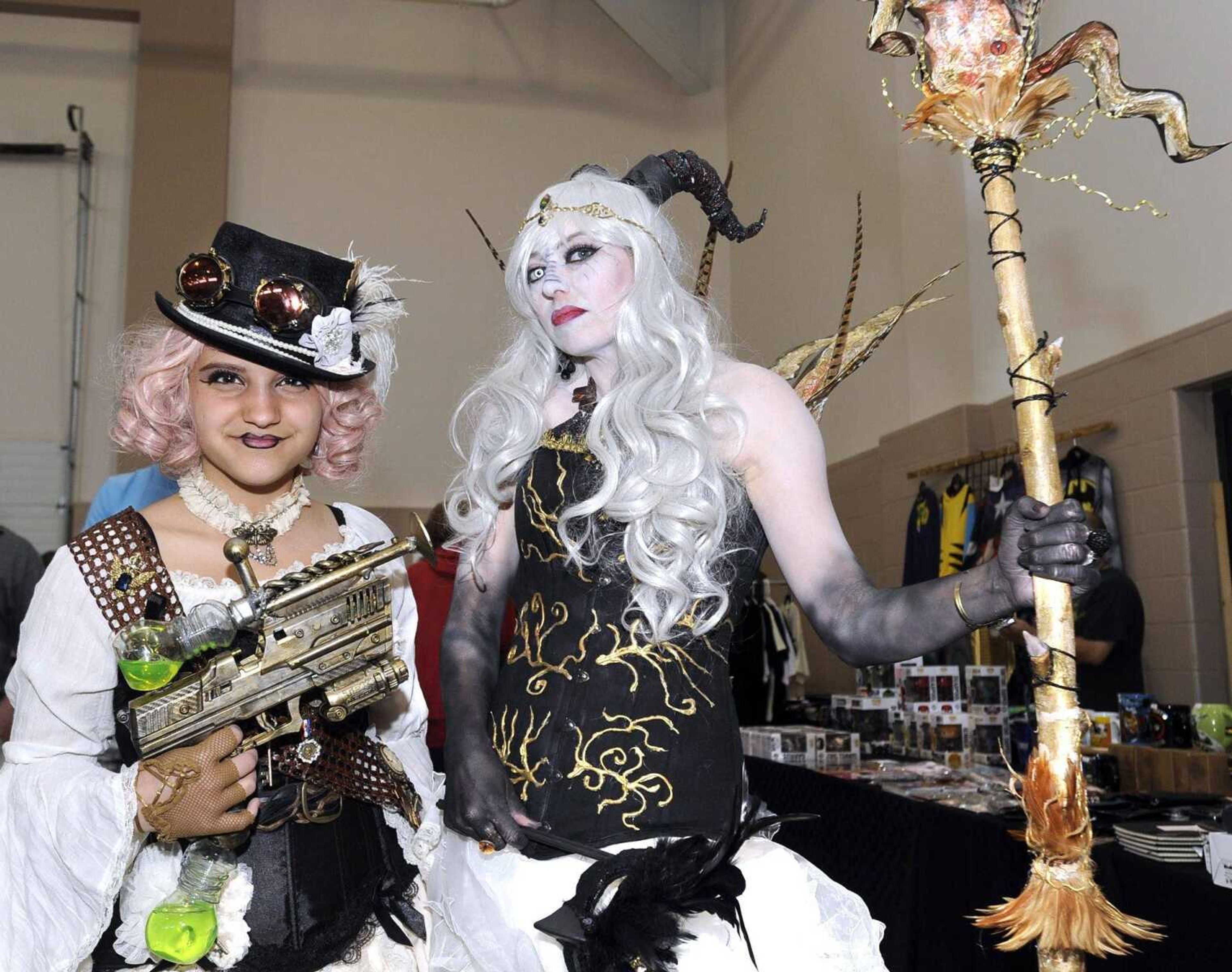 Amari Moore, left, as a steampunk captain poses for a photo with LaKrisha Moore, who later won the costume contest dressed as Goblin Queen, at Cape Comic Con on April 16 at the Osage Centre.