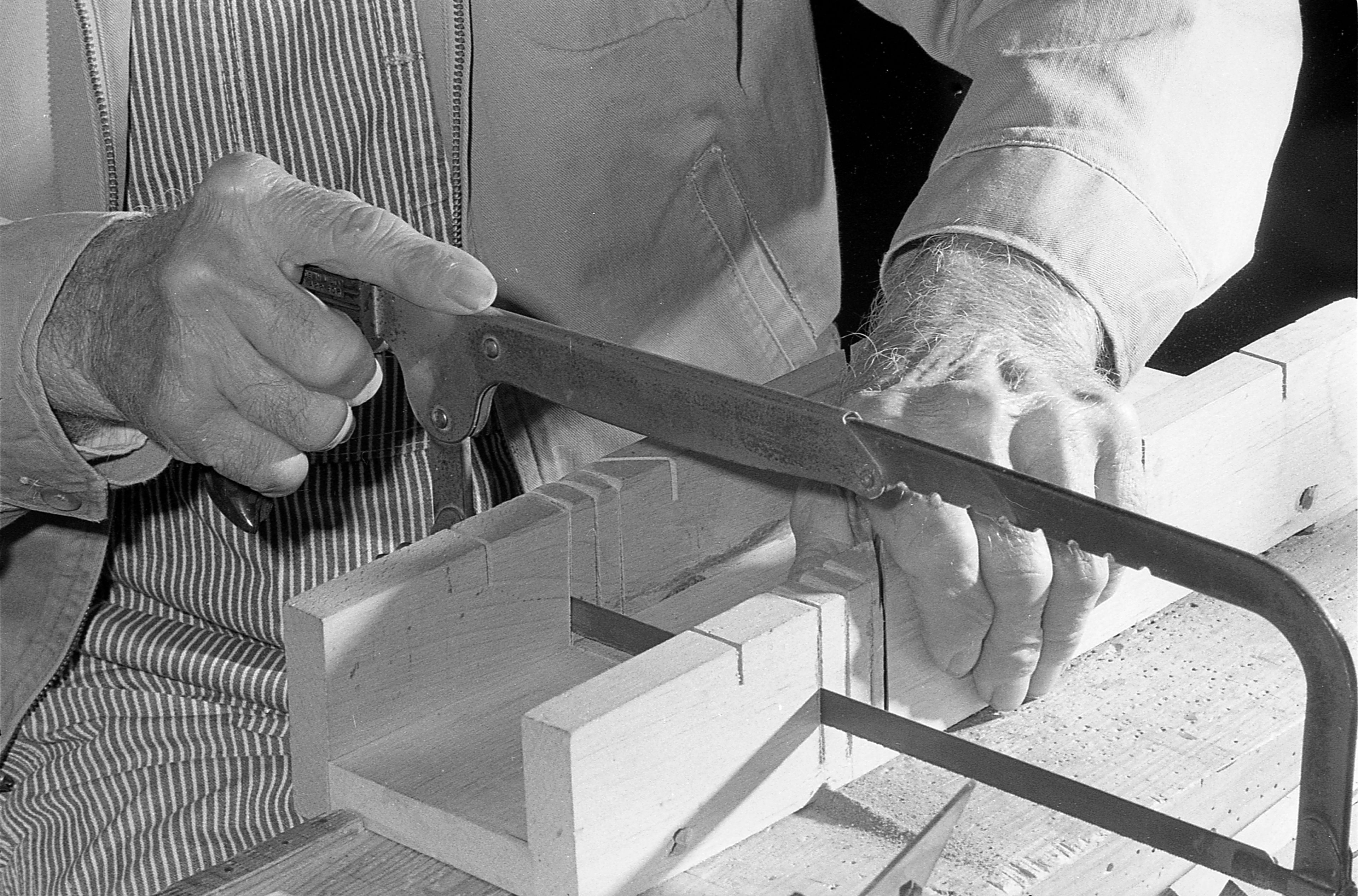 In this close-up, Ted Suedekum uses his saw. Although he has been a retired dairy farmer 12 years, Suedekum began working with crafts three years ago when, he says, “I got tired of just sitting around at craft shows.”