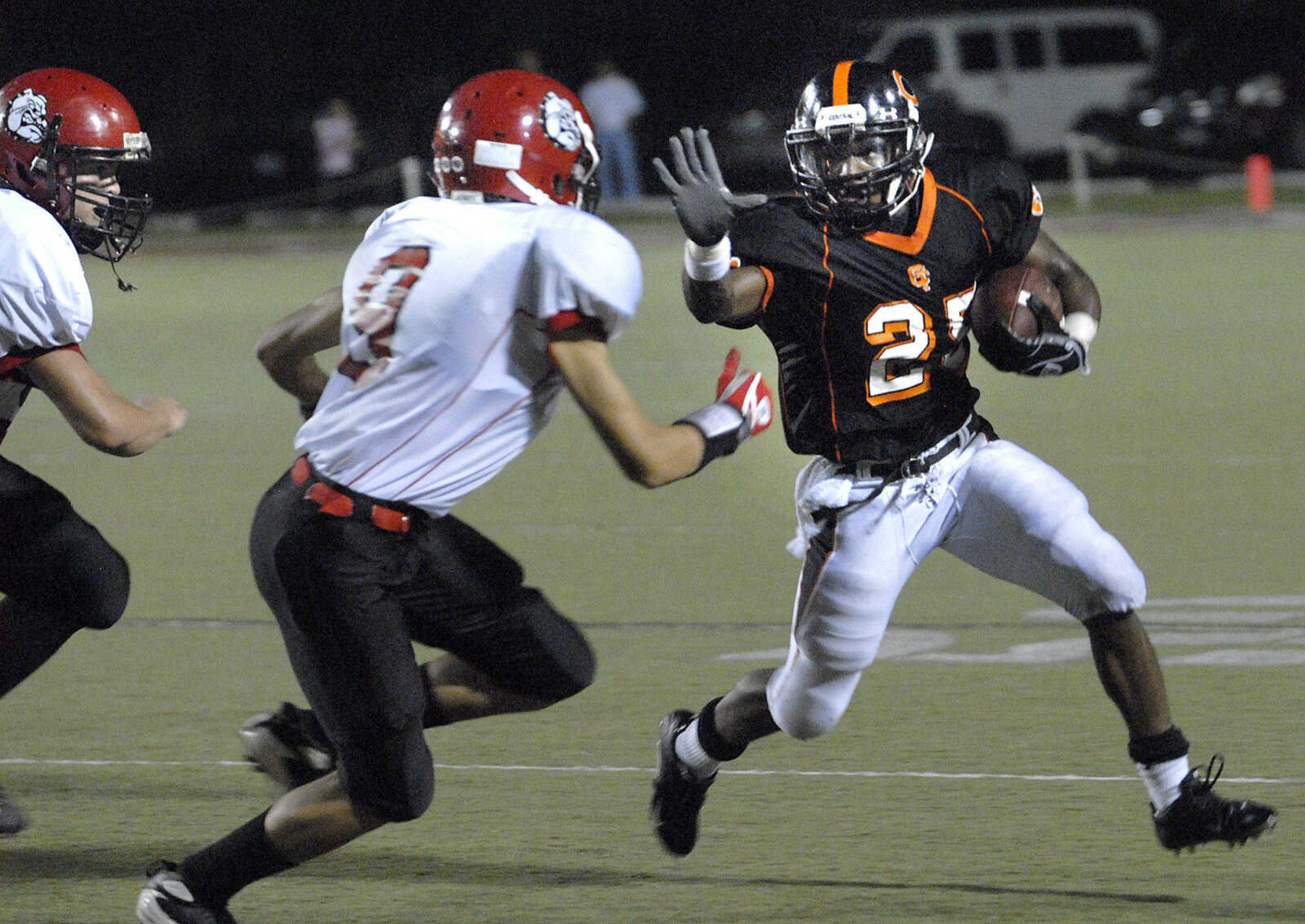 FRED LYNCH ~ flynch@semissourian.com
Central's Chris Bryant challenges Sikeston's Trey Lewis for extra yards during the second quarter Thursday at Houck Stadium.