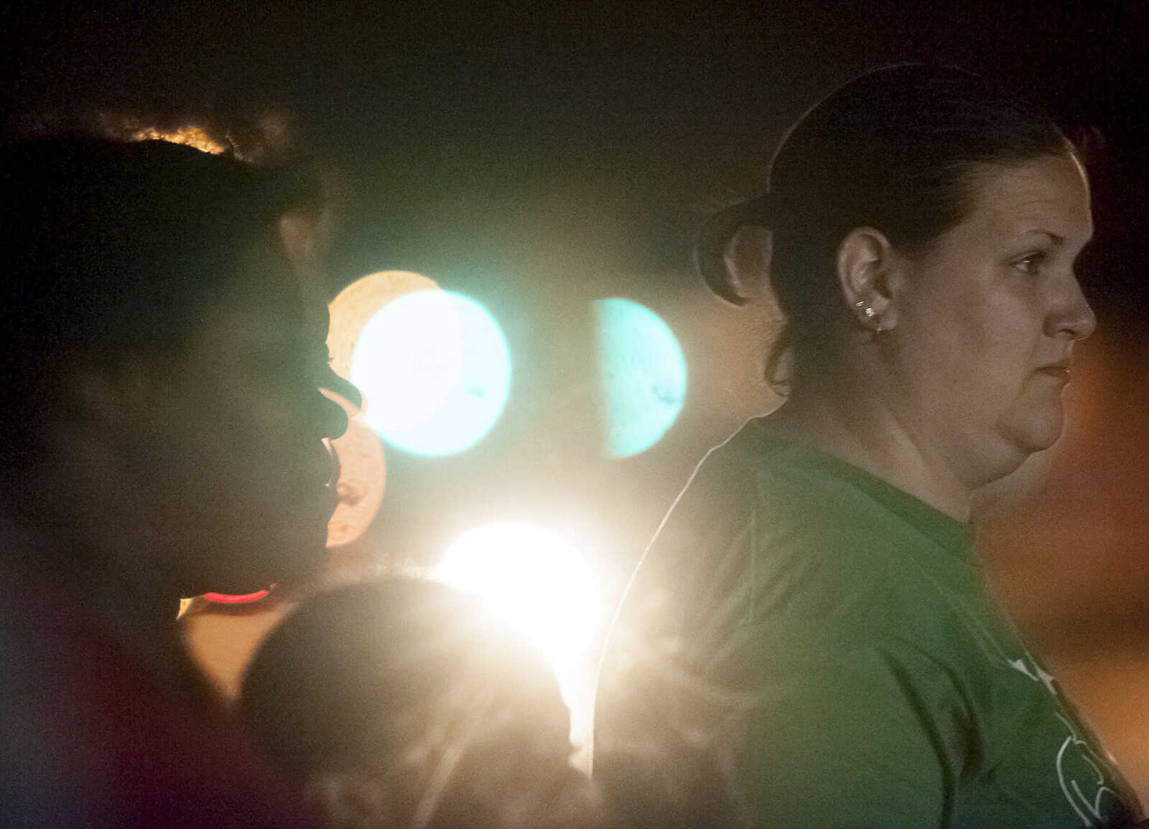 ADAM VOGLER ~ avogler@semissourian.com
Bystanders watch an actress beleived to be Rosamund Pike during a scene on the set of "Gone Girl," Friday, Sept. 20, at the Rhodes 101at 546 S. Sprigg St. in Cape Girardeau. Pike plays Amy Dunne in the film which is based on a novel of the same name by Gillian Flynn.