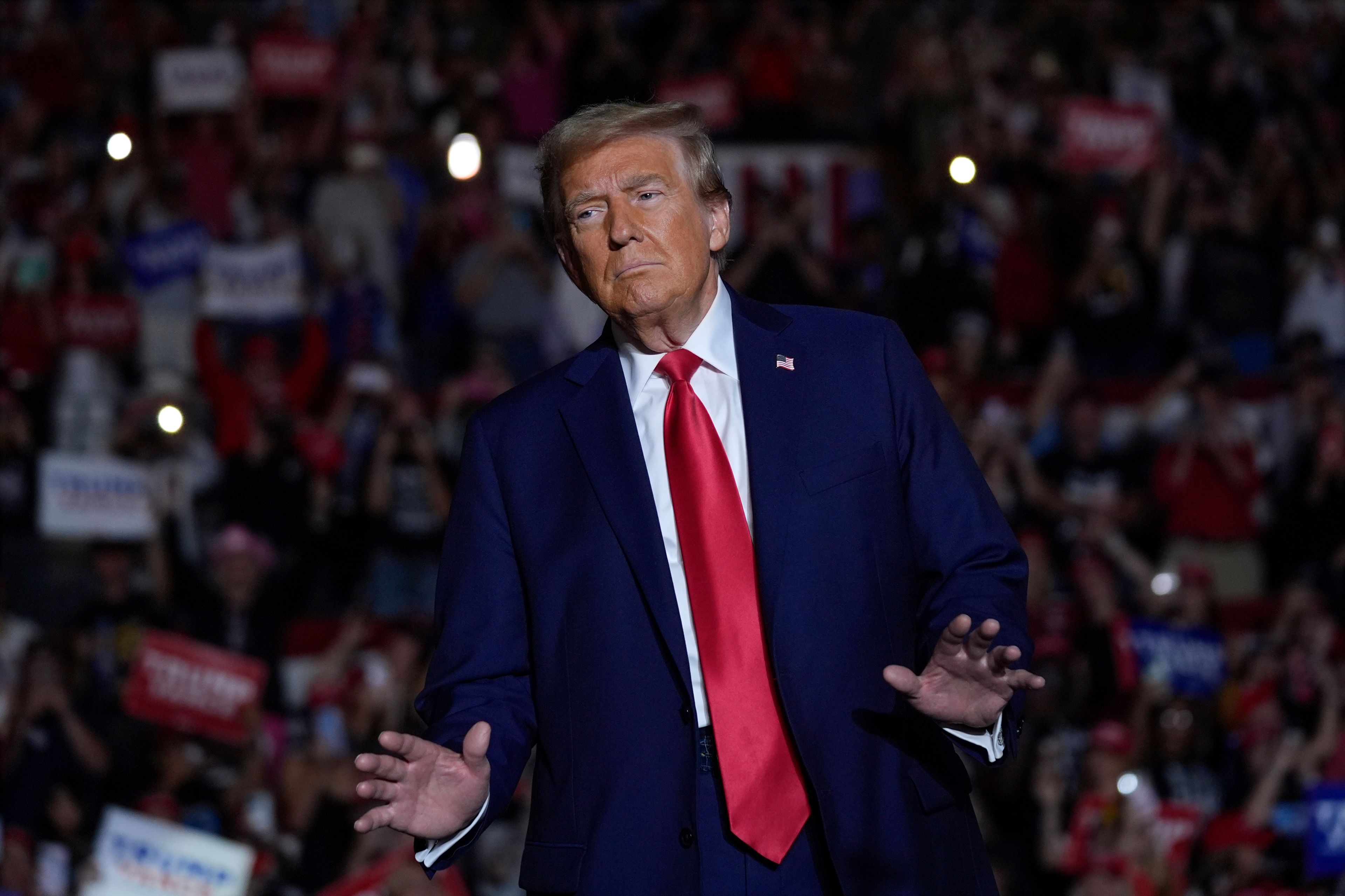 Republican presidential nominee former President Donald Trump arrives at a campaign rally at Williams Arena at Mignes Coliseum, Monday, Oct. 21, 2024, in Greenville, N.C. (AP Photo/Evan Vucci)