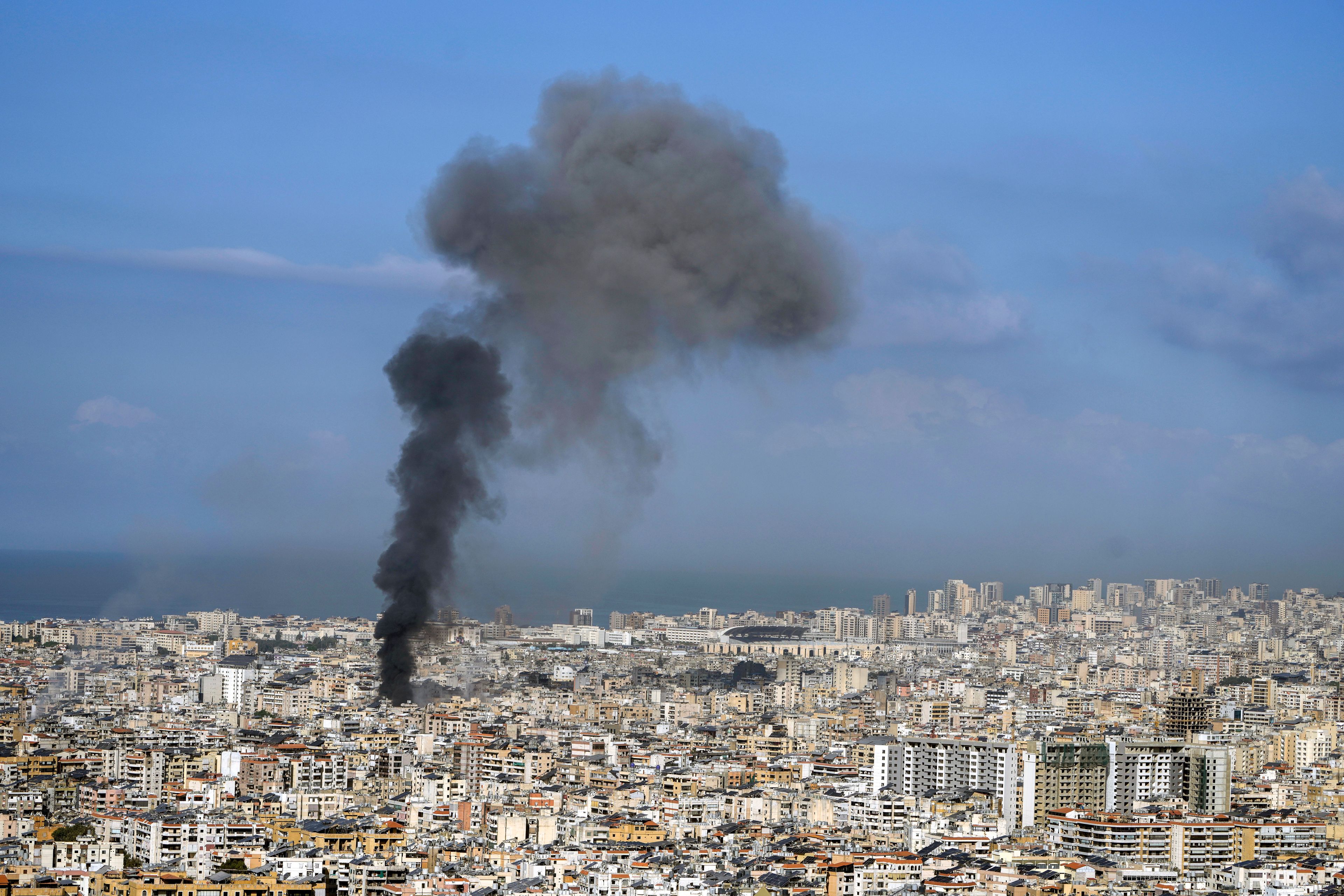 Smoke rises after an Israeli airstrike on Dahiyeh, in the southern suburb of Beirut, Lebanon, Saturday, Nov. 16, 2024. (AP Photo/Bilal Hussein)