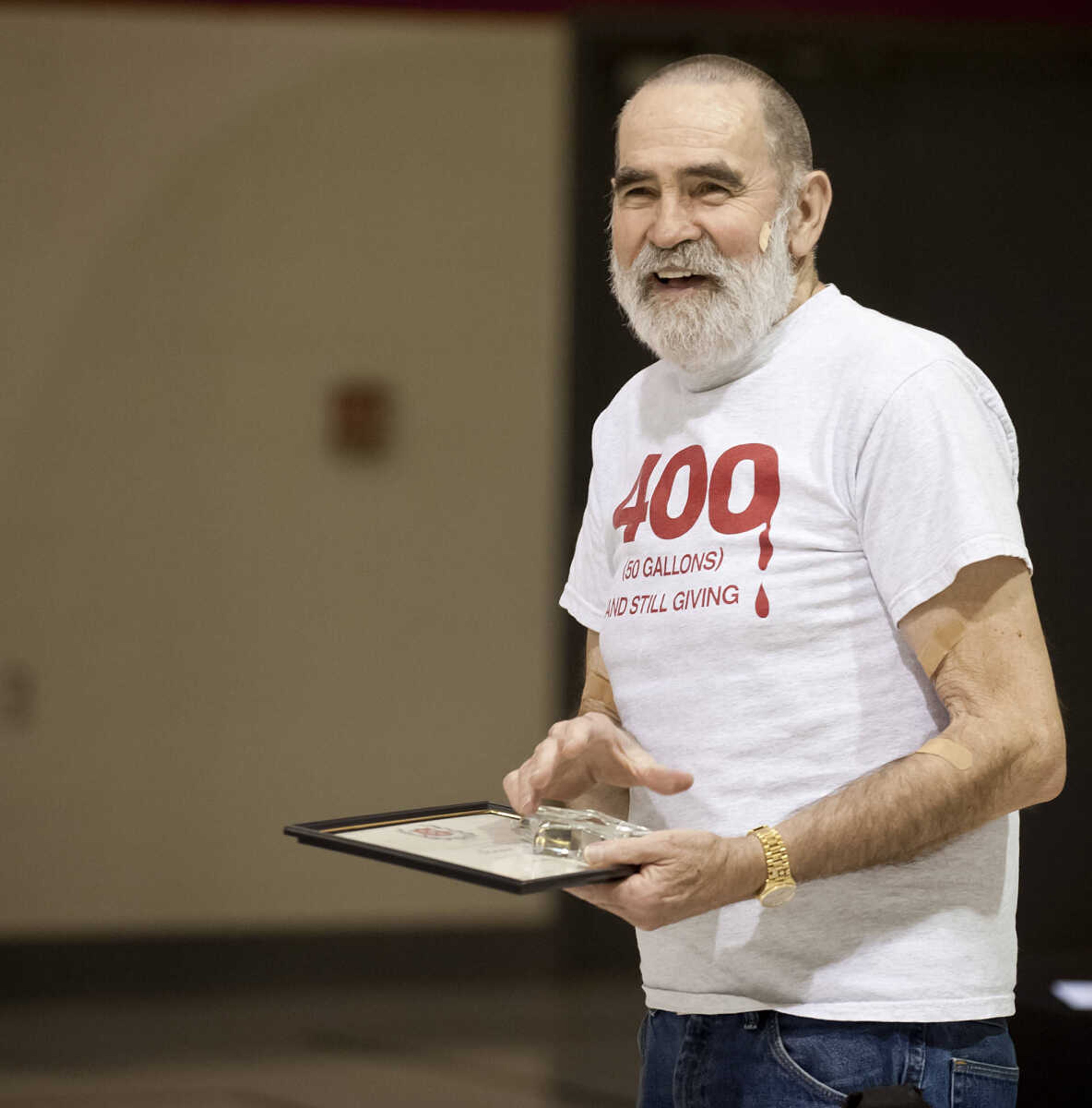 Steve Morse smiles after receiving the Volunteer Star Award during the Cape Girardeau Salvation Army's annual dinner, "A Night with the Stars," Thursday, May 8, at the Cape Girardeau Salvation Army.